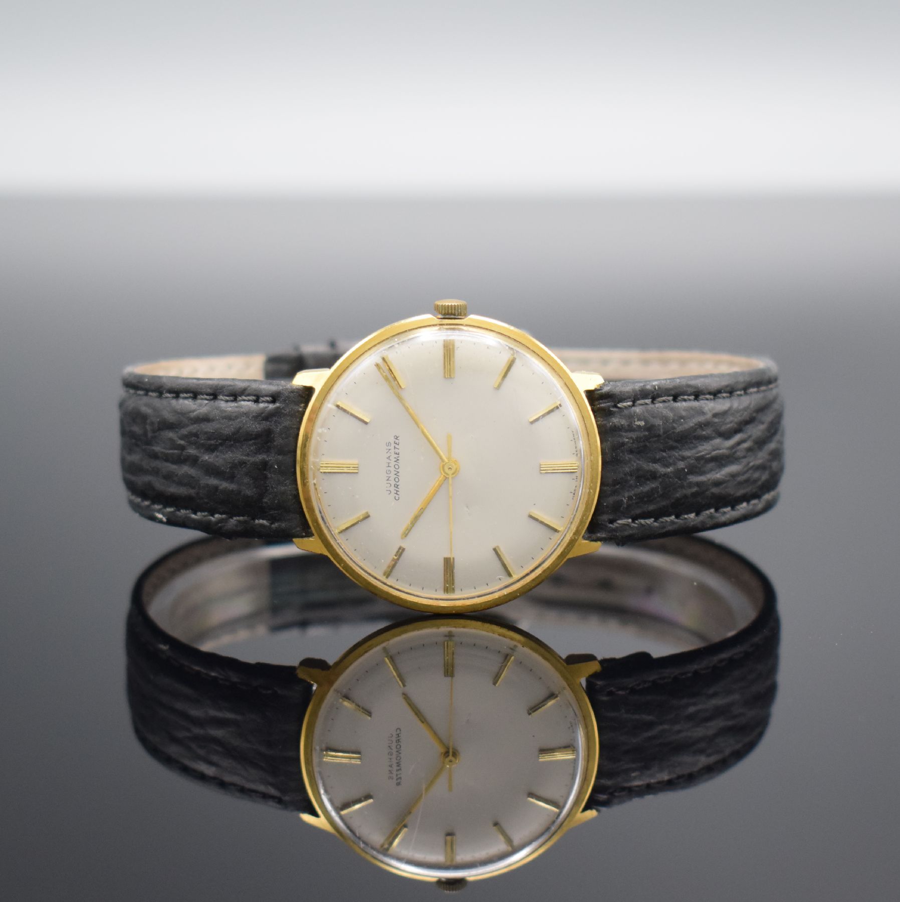 JUNGHANS Chronometer vergoldete Herrenarmbanduhr Kaliber 85/10, Deutschland um 1955, Handaufzug, Stahlboden aufgedr., Krone neutr. ers., silb. ...