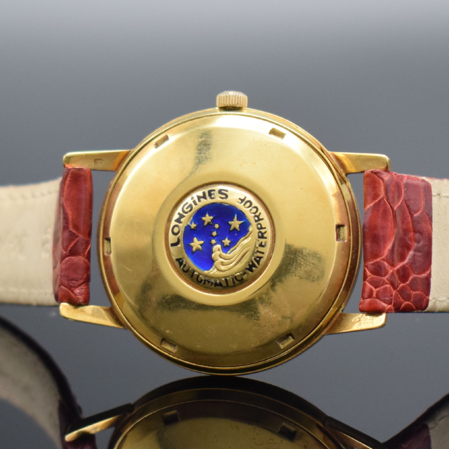 Detail e: LONGINES Conquest Herrenarmbanduhr in GG 750/000 Referenz 9021 3, Schweiz um 1960, Automatik, Boden m. Emailplakette verschr., ausgefallenes ...