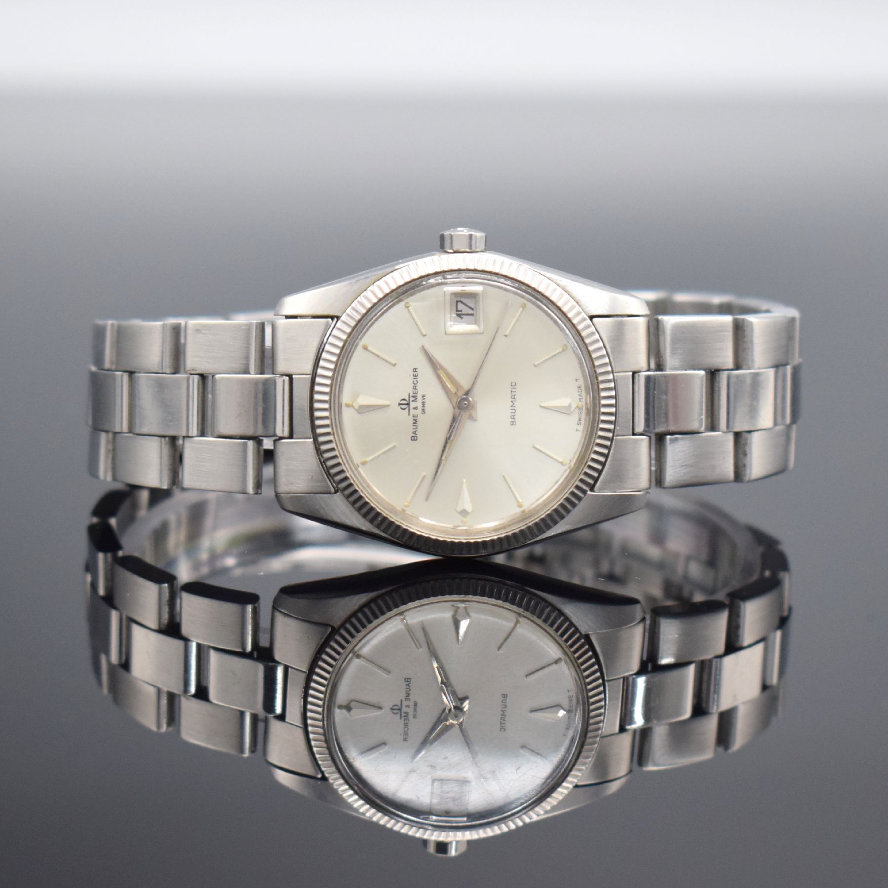 BAUME & MERCIER Baumatic Armbanduhr Referenz 1187 in Stahl Schweiz um 1970, Automatik, 2-teil. Geh., Boden geschr., orig. Gliederband m. Faltschl., ...