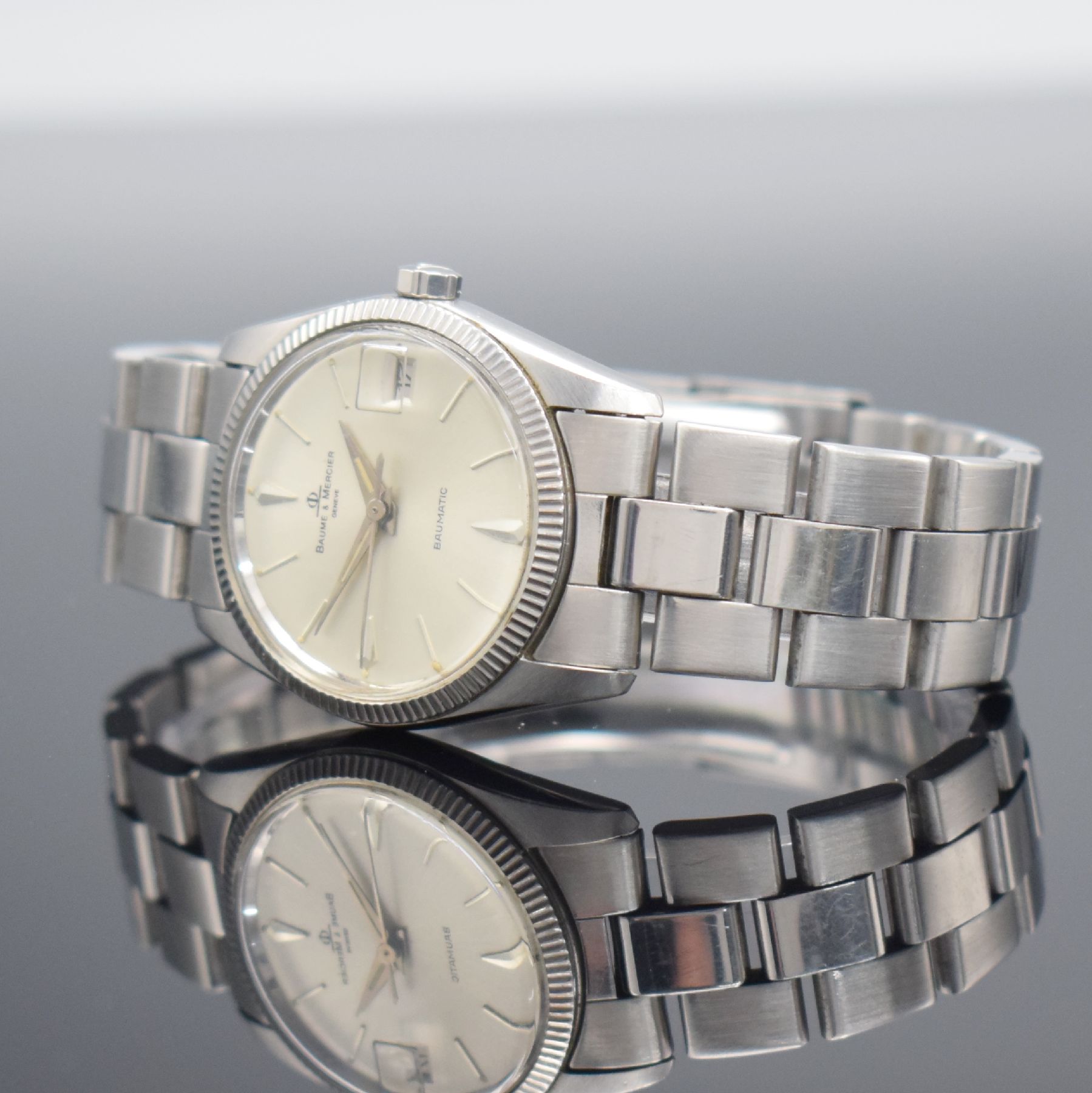 Detail d: BAUME & MERCIER Baumatic Armbanduhr Referenz 1187 in Stahl Schweiz um 1970, Automatik, 2-teil. Geh., Boden geschr., orig. Gliederband m. Faltschl., ...