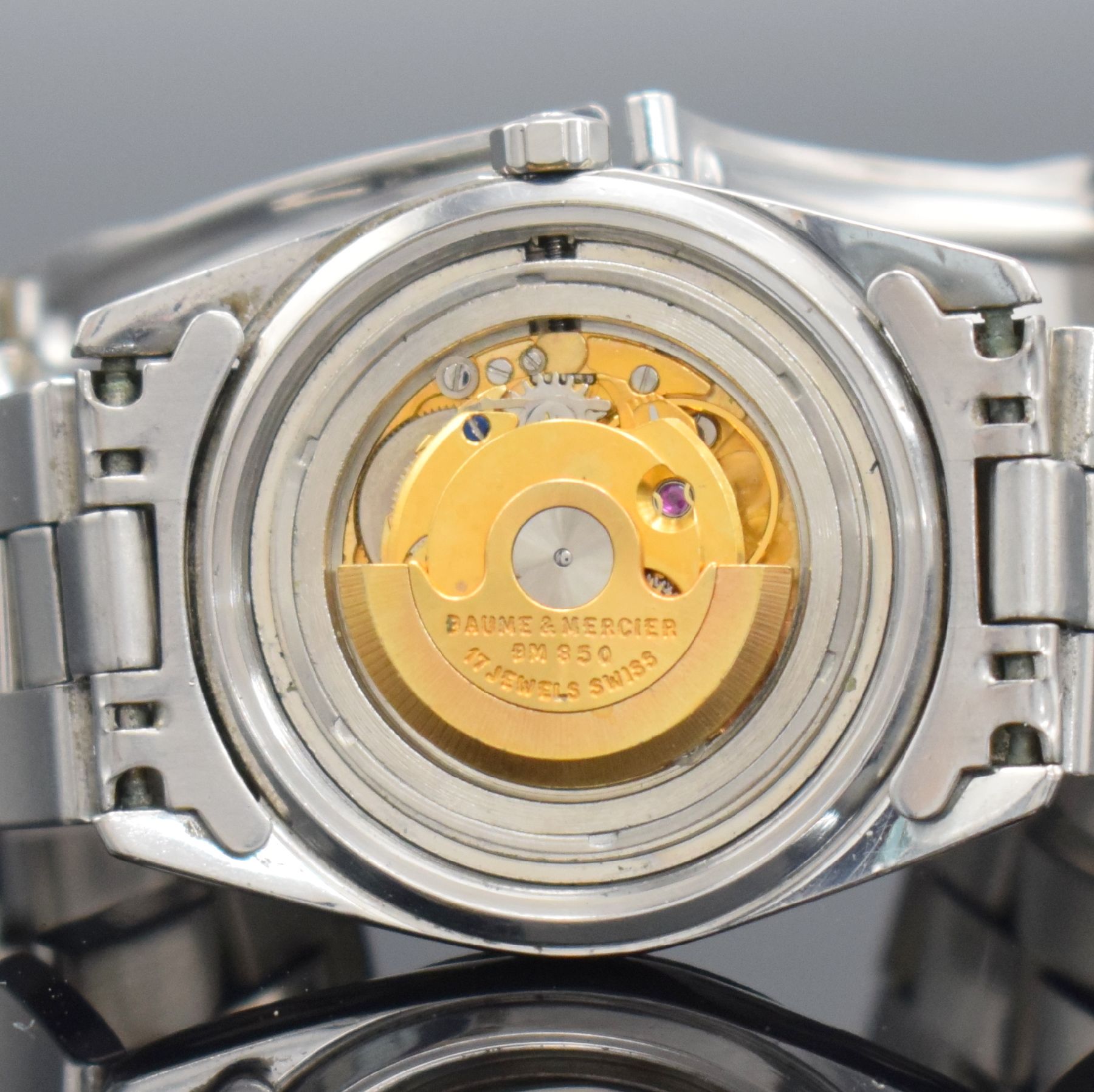 Detail h: BAUME & MERCIER Baumatic Armbanduhr Referenz 1187 in Stahl Schweiz um 1970, Automatik, 2-teil. Geh., Boden geschr., orig. Gliederband m. Faltschl., ...