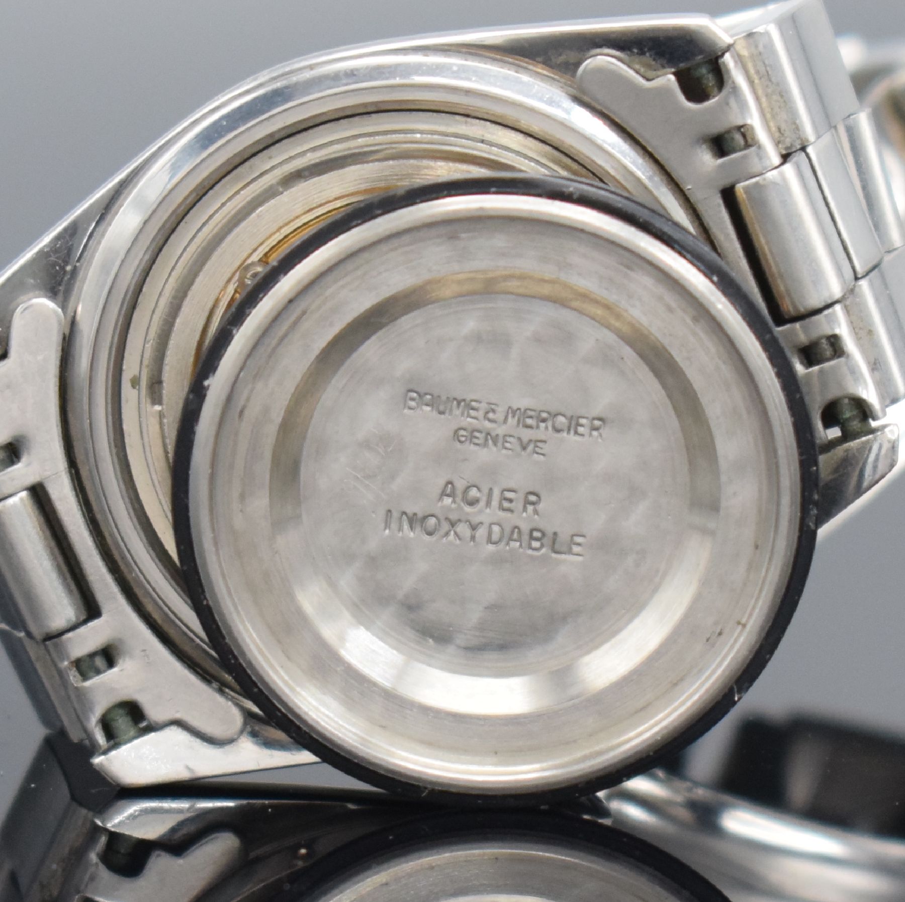 Detail i: BAUME & MERCIER Baumatic Armbanduhr Referenz 1187 in Stahl Schweiz um 1970, Automatik, 2-teil. Geh., Boden geschr., orig. Gliederband m. Faltschl., ...