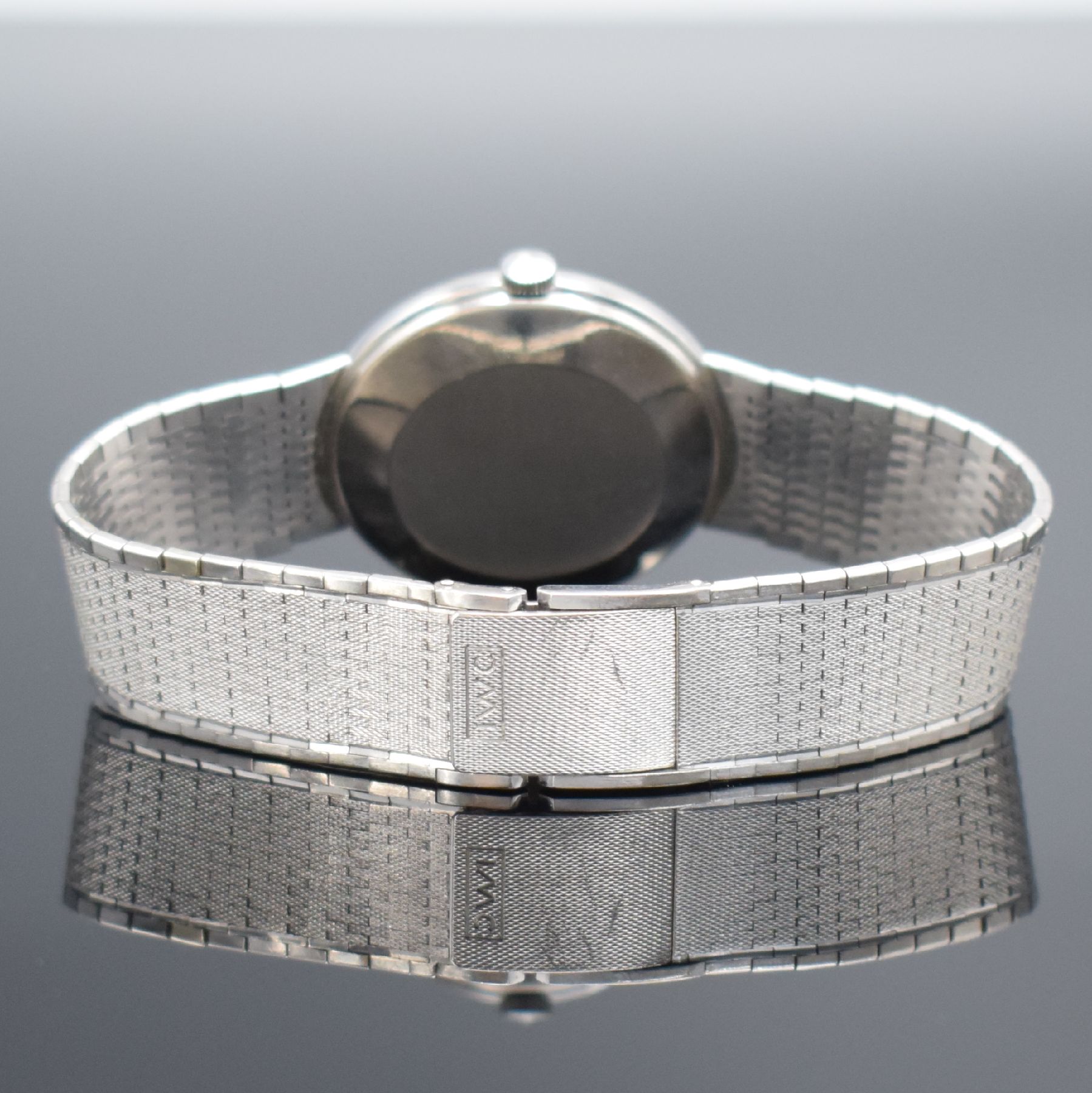 Detail e: IWC Herrenarmbanduhr Kaliber 8541 in WG 750/000 Referenz R 807 A mit original Goldband, Schweiz um 1965, Automatik, 2- teil. Geh., Boden gedr., ...