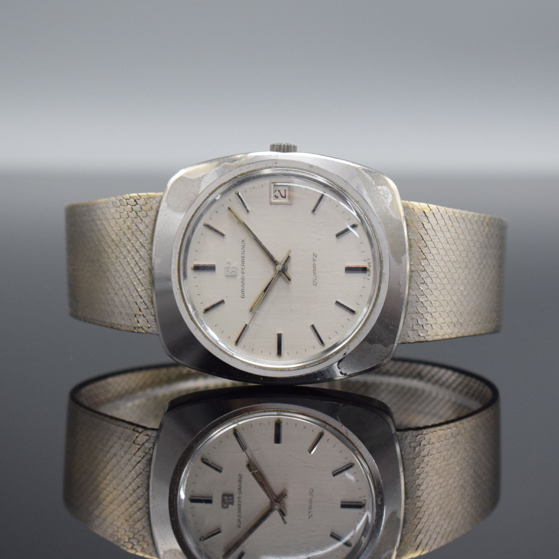 GIRARD PERREGAUX Herrenarmbanduhr in WG 750/000 mit neutralem Goldband in WG 750/000, Schweiz um 1970, quarz, massives Gehäuse, Boden geschr., ...