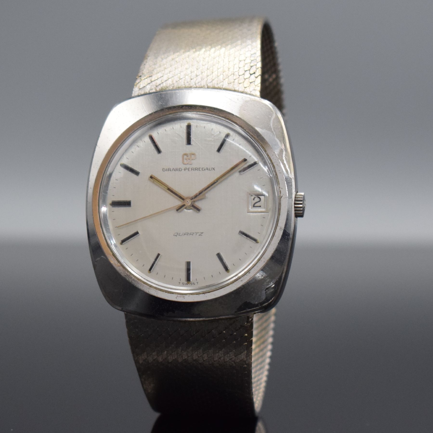 Detail b: GIRARD PERREGAUX Herrenarmbanduhr in WG 750/000 mit neutralem Goldband in WG 750/000, Schweiz um 1970, quarz, massives Gehäuse, Boden geschr., ...