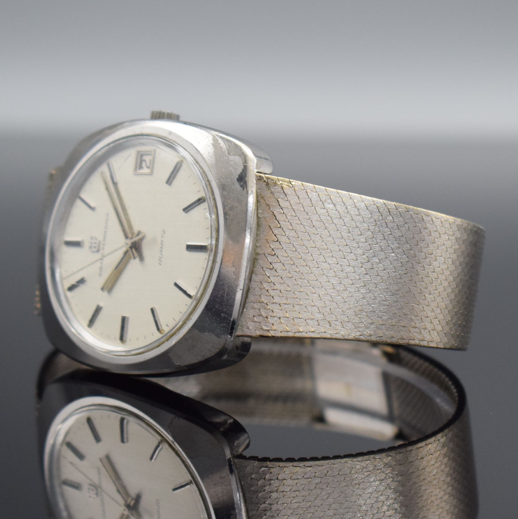Detail d: GIRARD PERREGAUX Herrenarmbanduhr in WG 750/000 mit neutralem Goldband in WG 750/000, Schweiz um 1970, quarz, massives Gehäuse, Boden geschr., ...