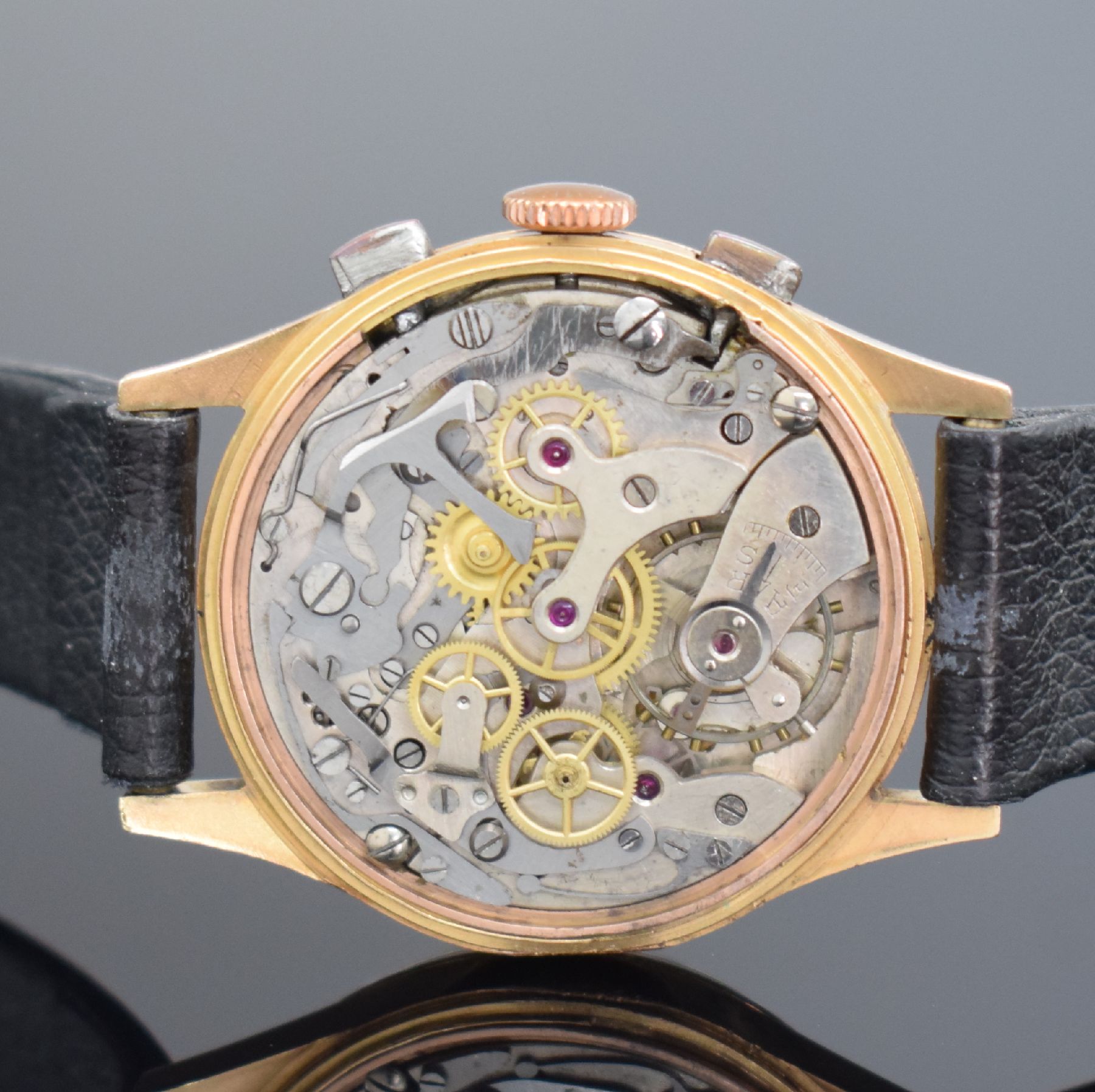 Detail f: CHRONOGRAPHE SUISSE Armbandchronograph in RG 750/000, Handaufzug, Schweiz um 1950, Geh. l. dell., Boden, Glasrand & verg. Cuv. aufgedr., gold. ...