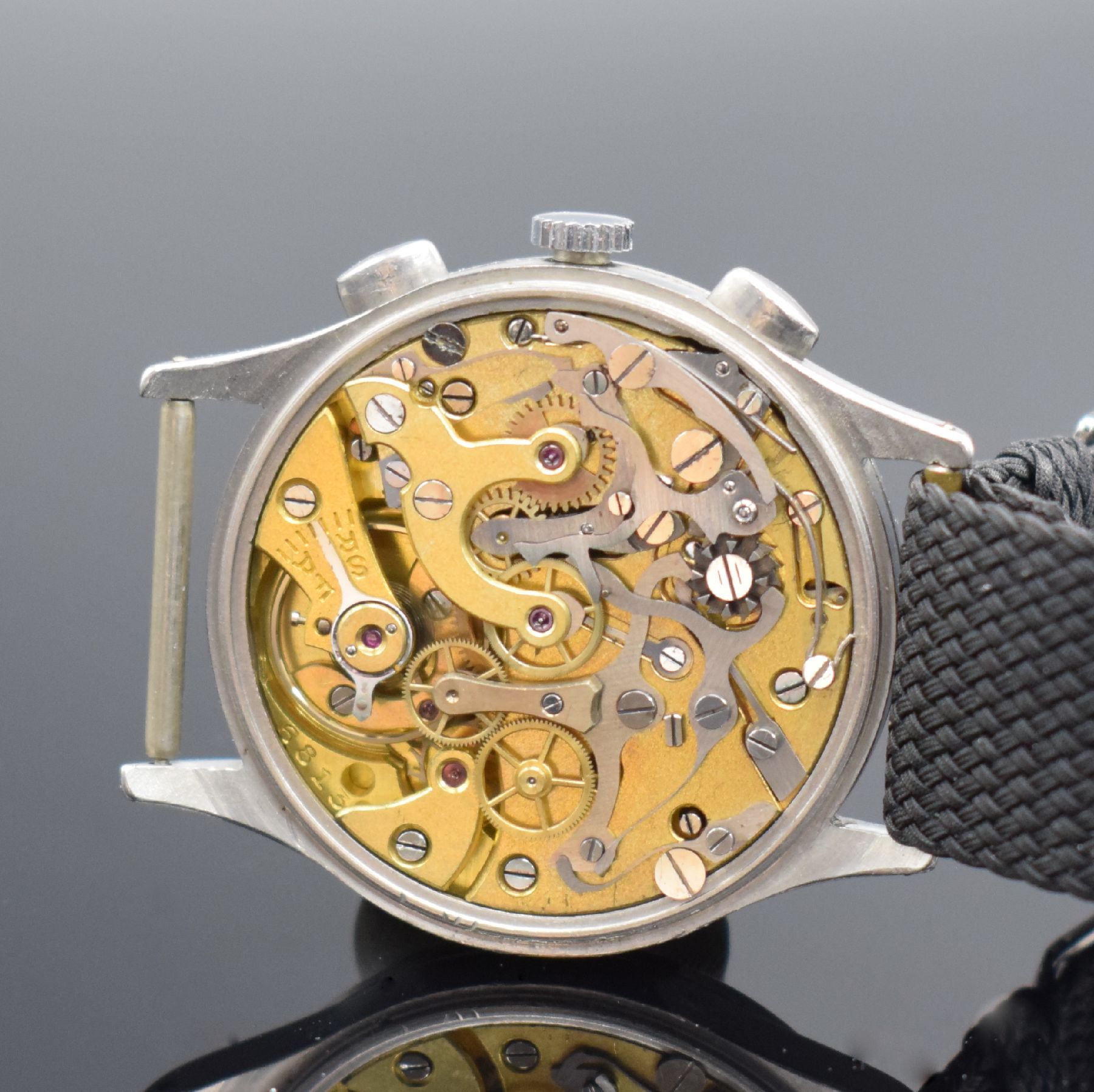 Detail c: LEMANIA Schaltradchronograph Kaliber 15TL, Handaufzug, Schweiz 1940er Jahre, 3-teil. Edelstahlgeh., Boden & Glasrand aufgedr., schwarzes Zifferbl. m. ...