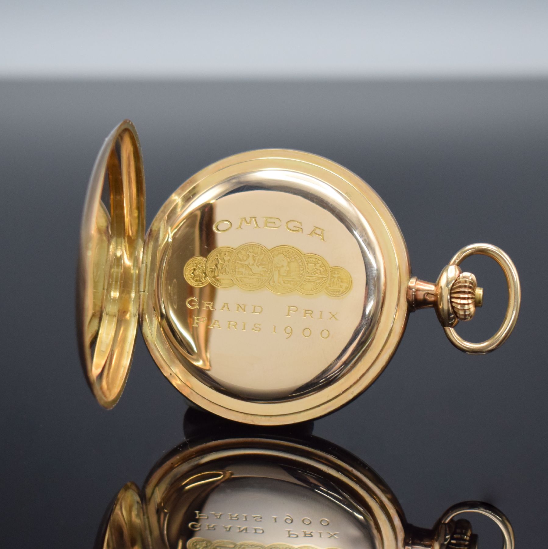 Detail e: OMEGA Savonette Herrentaschenuhr in RoseG 585/000, Schweiz um 1910, 4-teil. Goldgeh. l. dell., Goldcuvette m. Medaillengravur, beide Schalen sym. ...