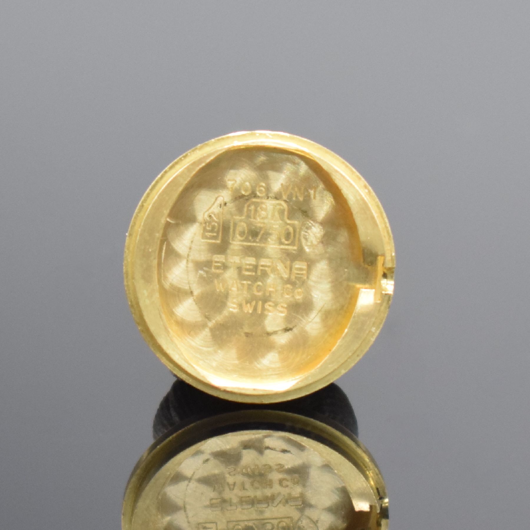 Detail i: ETERNA Damenarmbanduhr in GG 750/000, Schweiz um 1970, Handaufzug, Boden aufgedr., orig. Goldband in 750/000, silb. Zifferbl. m. aufgel. Std.-Ind., ...