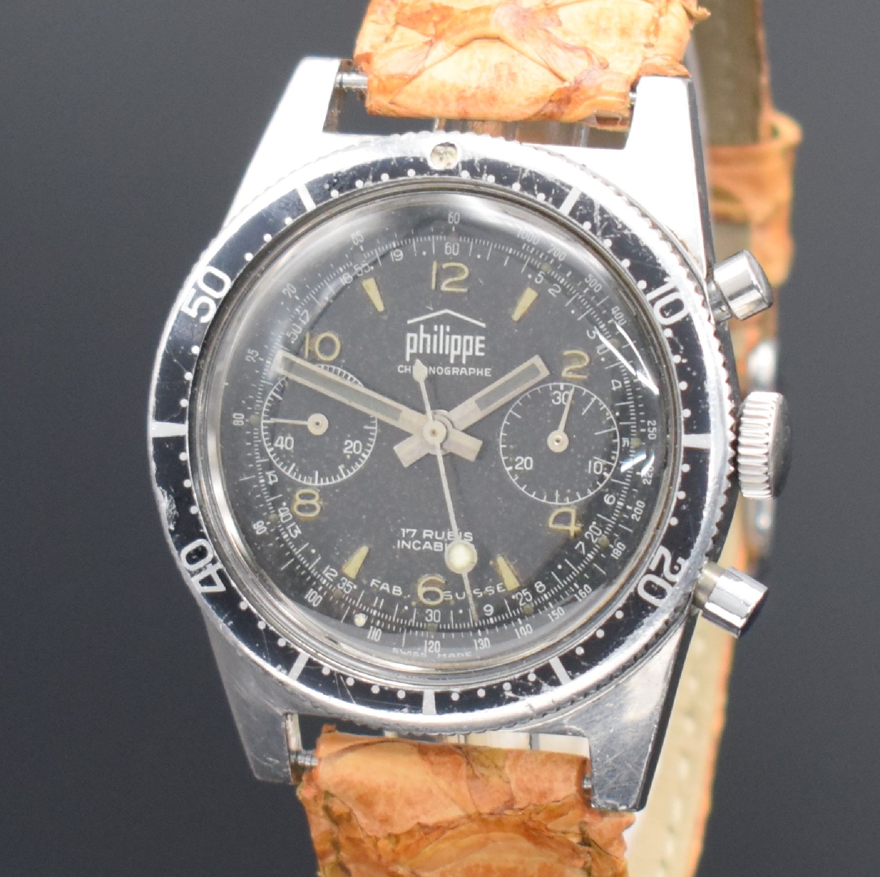 Detail a: PHILIPPE Herrenarmbanduhr mit Chronograph, Schweiz um 1960, Handaufzug, 2-teil. Geh. in Stahl, Boden geschr., eins. drehb. Lünette, schwarzes ...