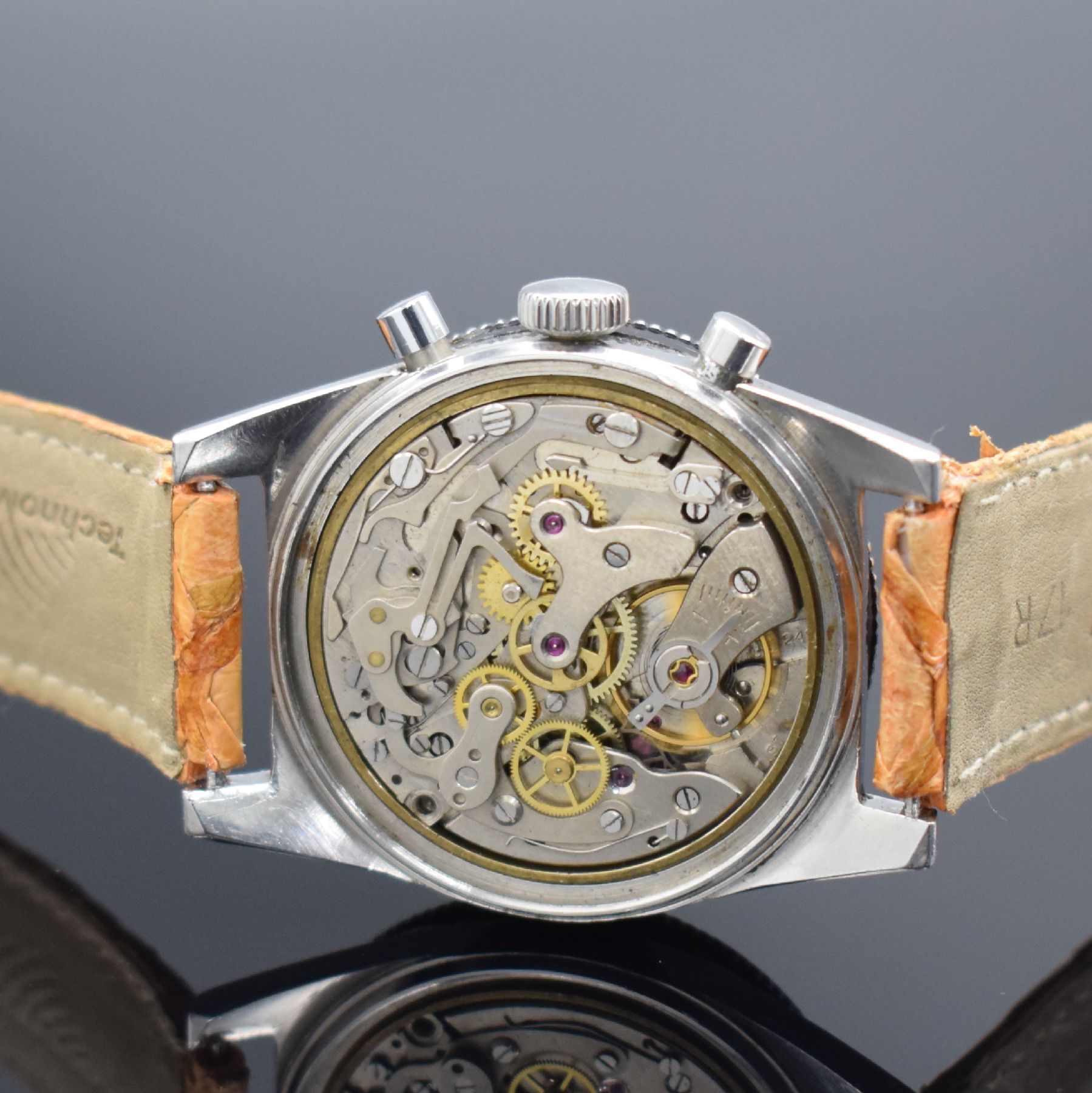 Detail c: PHILIPPE Herrenarmbanduhr mit Chronograph, Schweiz um 1960, Handaufzug, 2-teil. Geh. in Stahl, Boden geschr., eins. drehb. Lünette, schwarzes ...