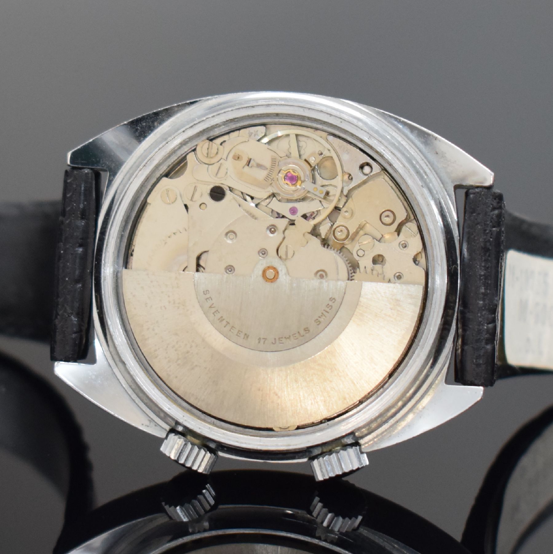 Detail f: VENUS Herrenarmbanduhr mit Wecker, Schweiz um 1970, Automatik, verchr. Geh., Edelstahlboden verschr., silb. Zifferbl. m. silb. Ind. & Leuchtzeigern, ...