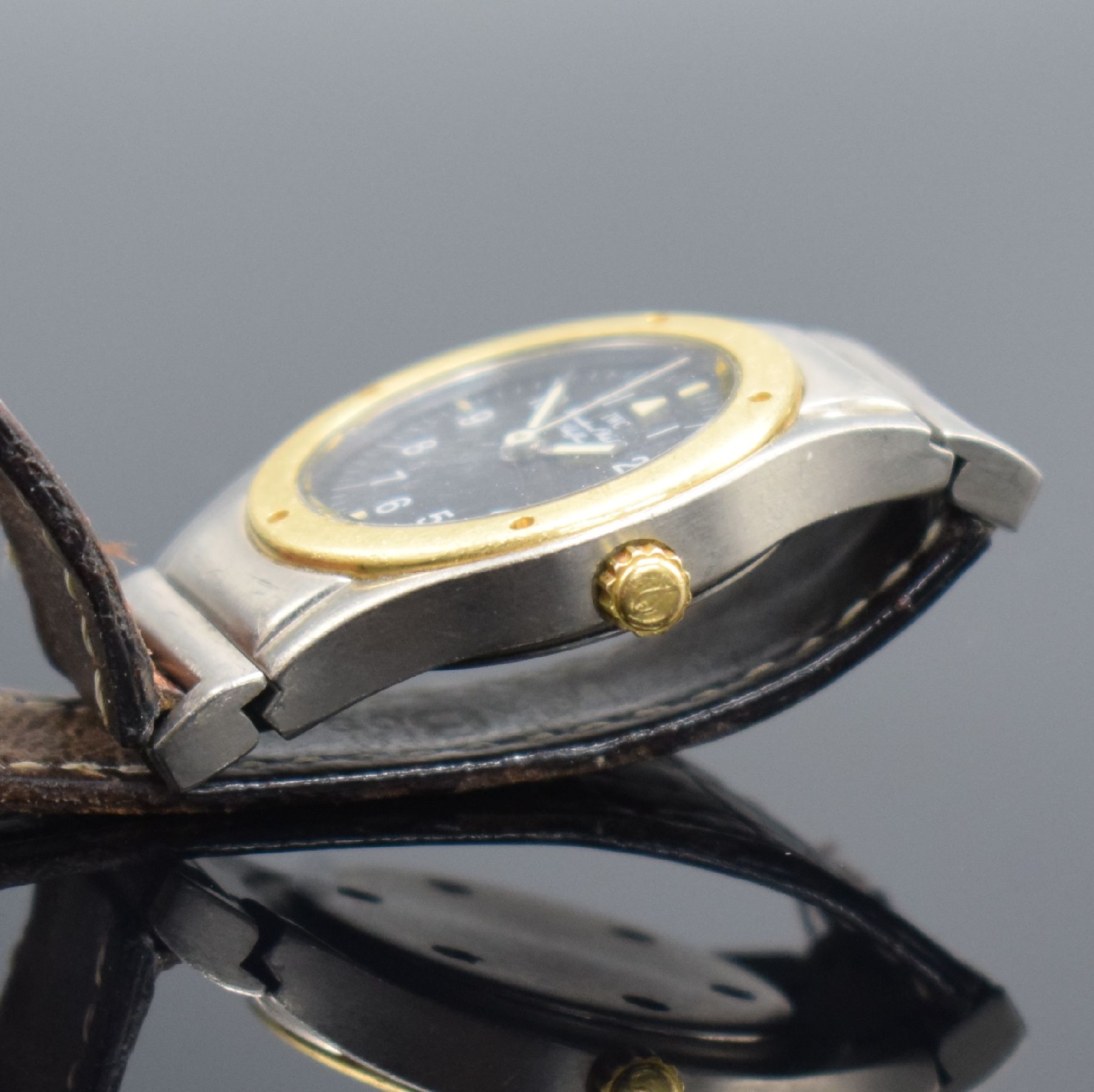 Detail e: IWC Damenarmbanduhr Serie Ingenieur Referenz 4560, Schweiz um 1990, Titan/Gold kombiniert inkl. Lederband m. orig. Faltschl., Boden verschr., ...