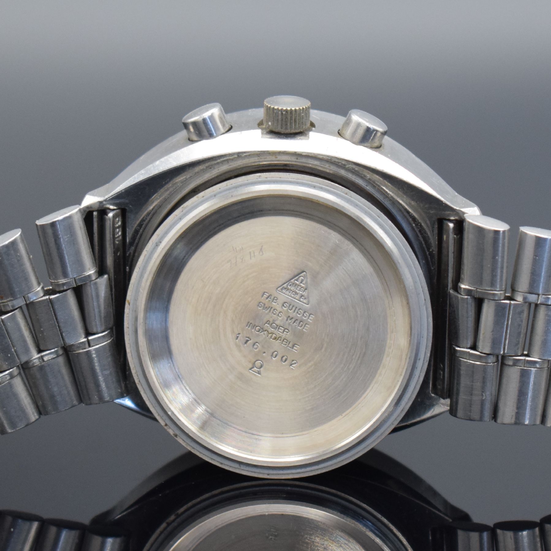 Detail h: OMEGA Speedmaster Professional Mark III Armbandchronograph Referenz 176.002, Schweiz um 1972, Automatik, massives Edelstahlgeh., Boden m. ...