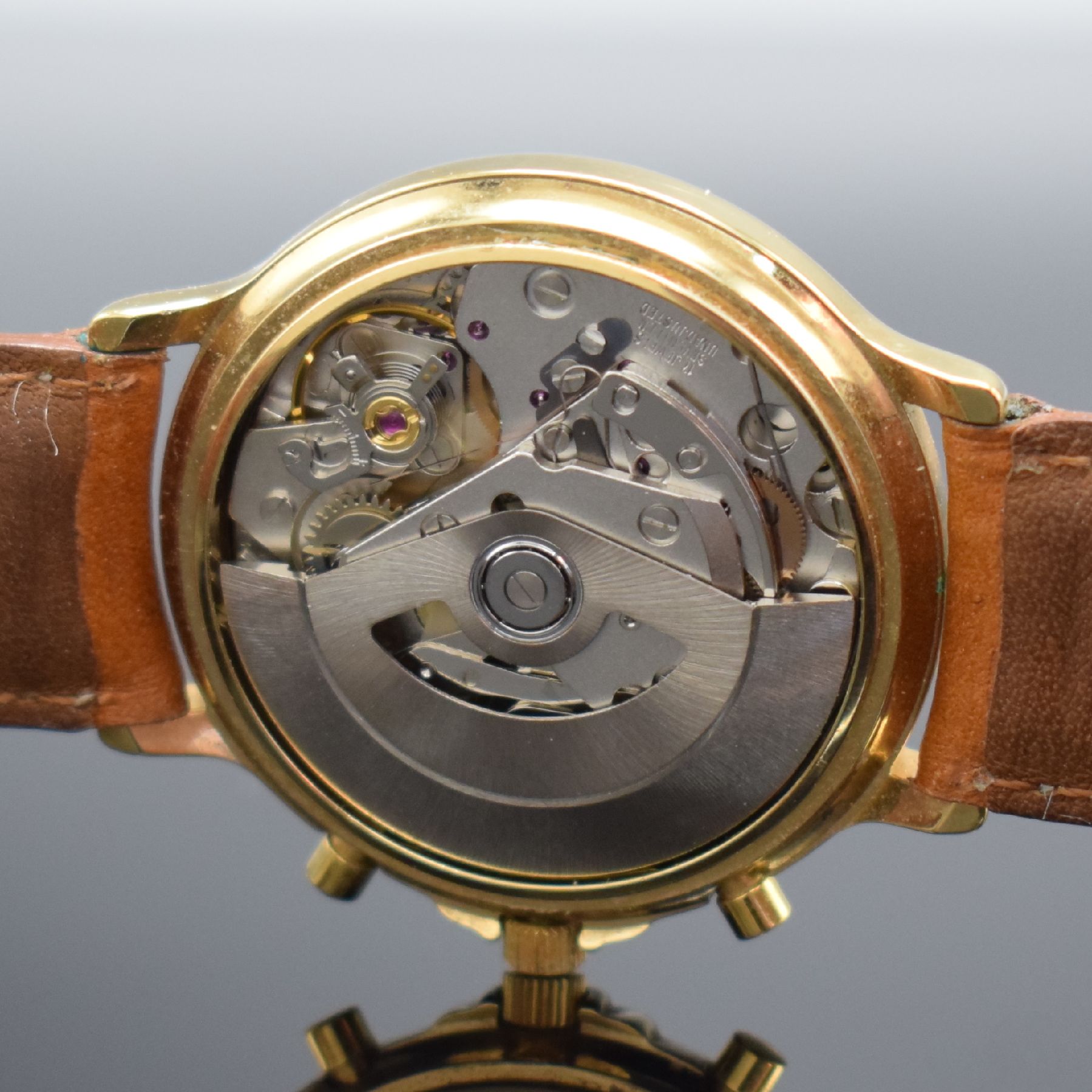 Detail f: RODANIA Herrenarmbanduhr mit Chronograph & Mondphase, Schweiz um 1985, Automatik, verg. Geh., Boden aufgedr., weißes Zifferbl. m. gold. Ind. & ...