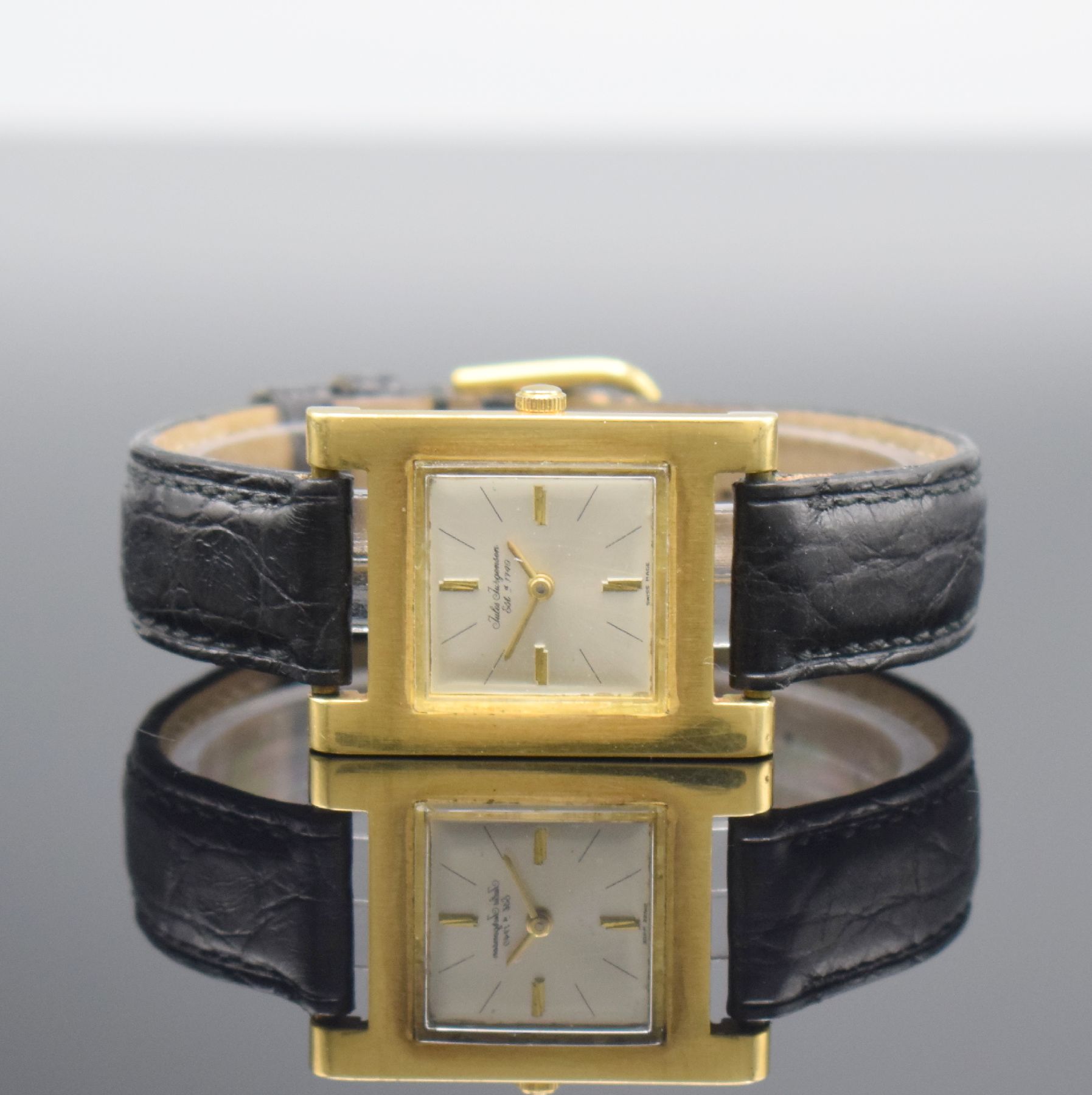 JULES JUERGENSEN Armbanduhr in GG 750/000, Handaufzug, Schweiz um 1968, Carree-Arrondee- Geh., Boden aufgedr., verg. Rundankerw. von AS, Kal. 1193, ...