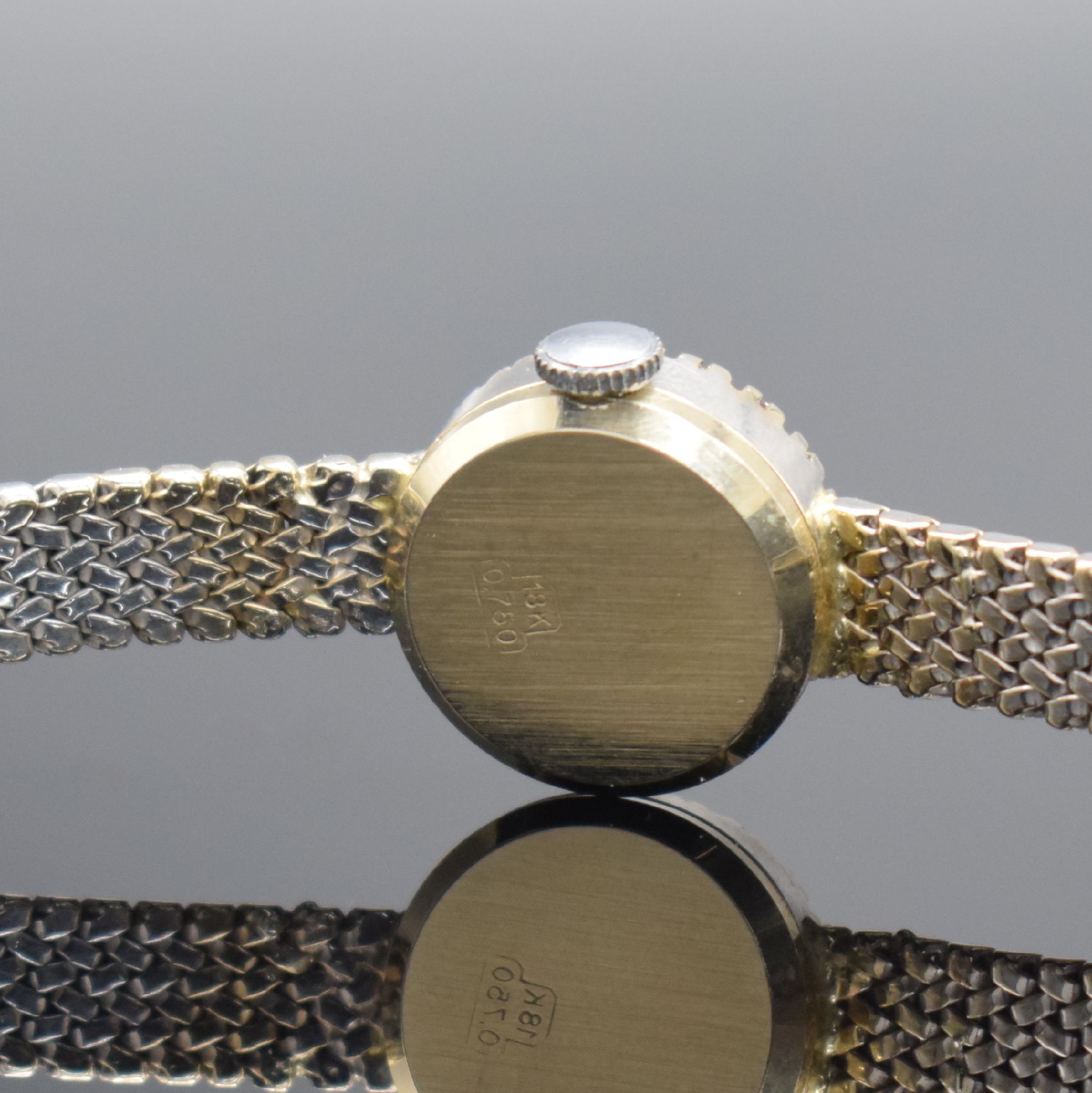 Detail c: METEOR Damenarmbanduhr in WG 750/000, Handaufzug, Schweiz um 1965, Boden aufgedr., Lünette m. Steinbesatz, silb. Zifferbl. m. aufgel. Indizes ...