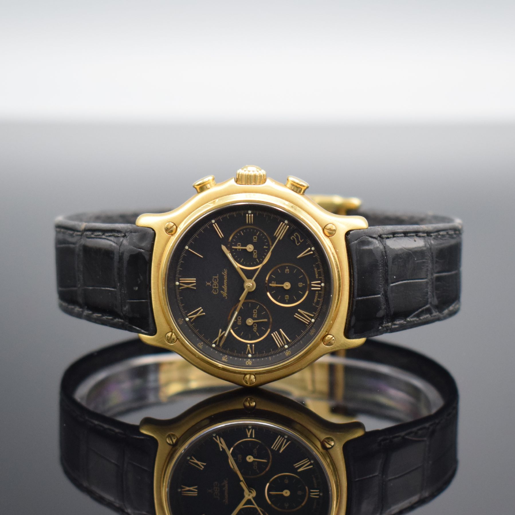 EBEL El Primero Schaltradchronograph in GG 750/000, Schweiz um 1995, Automatik, Ref. 8134901, Boden aufgedr., neutr. Lederband m. orig. Faltschl. in ...