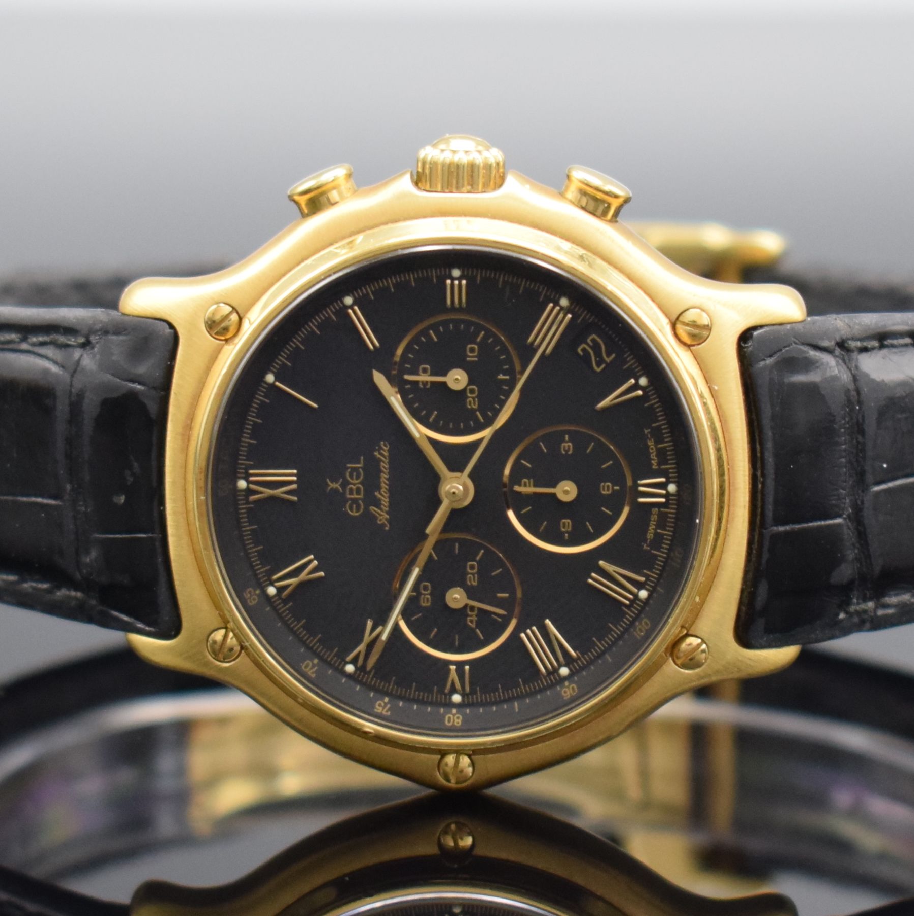 Detail a: EBEL El Primero Schaltradchronograph in GG 750/000, Schweiz um 1995, Automatik, Ref. 8134901, Boden aufgedr., neutr. Lederband m. orig. Faltschl. in ...