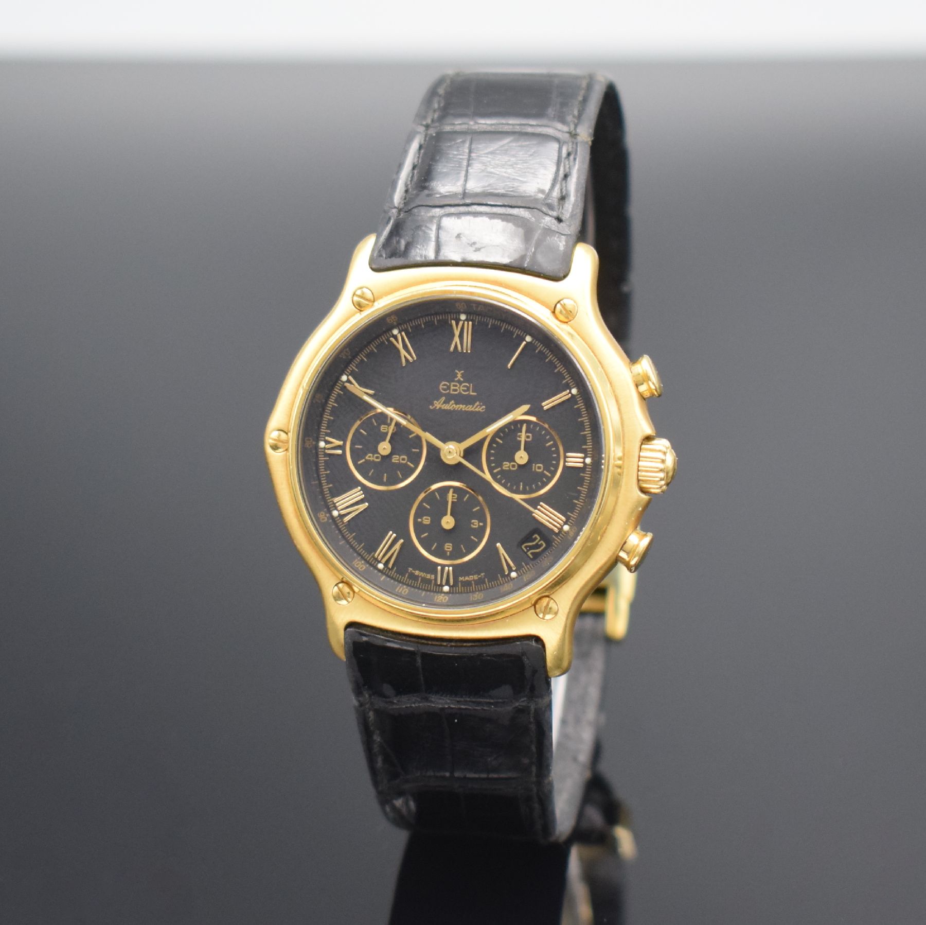 Detail b: EBEL El Primero Schaltradchronograph in GG 750/000, Schweiz um 1995, Automatik, Ref. 8134901, Boden aufgedr., neutr. Lederband m. orig. Faltschl. in ...
