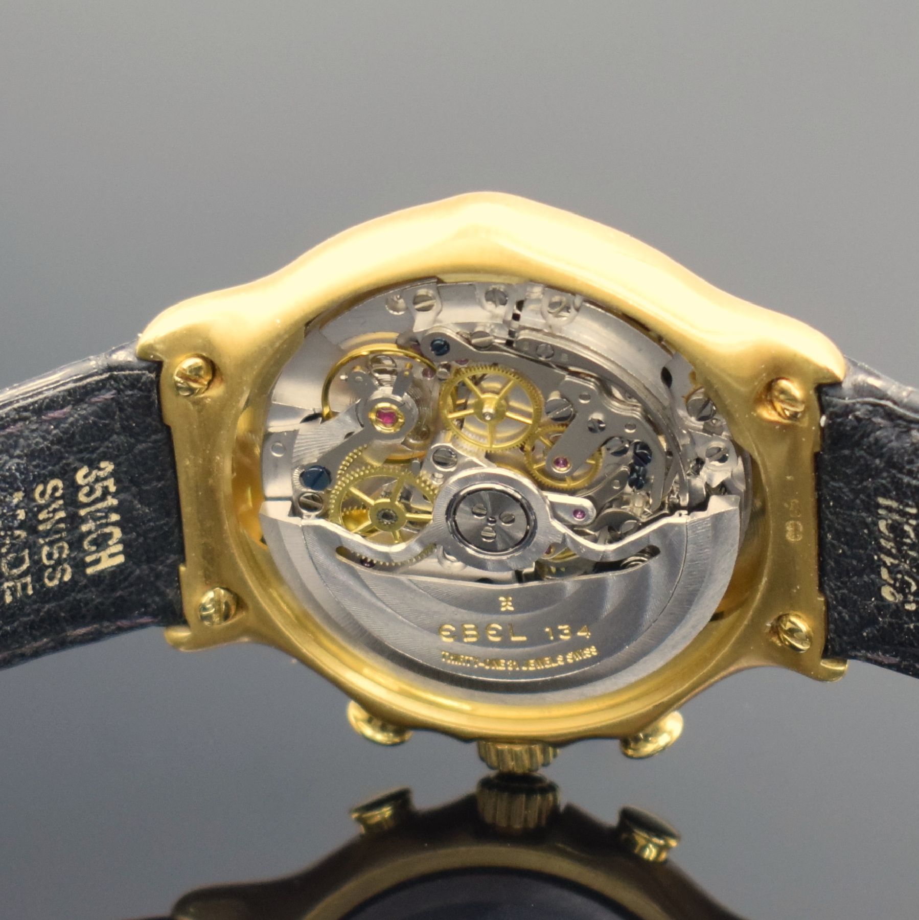 Detail g: EBEL El Primero Schaltradchronograph in GG 750/000, Schweiz um 1995, Automatik, Ref. 8134901, Boden aufgedr., neutr. Lederband m. orig. Faltschl. in ...