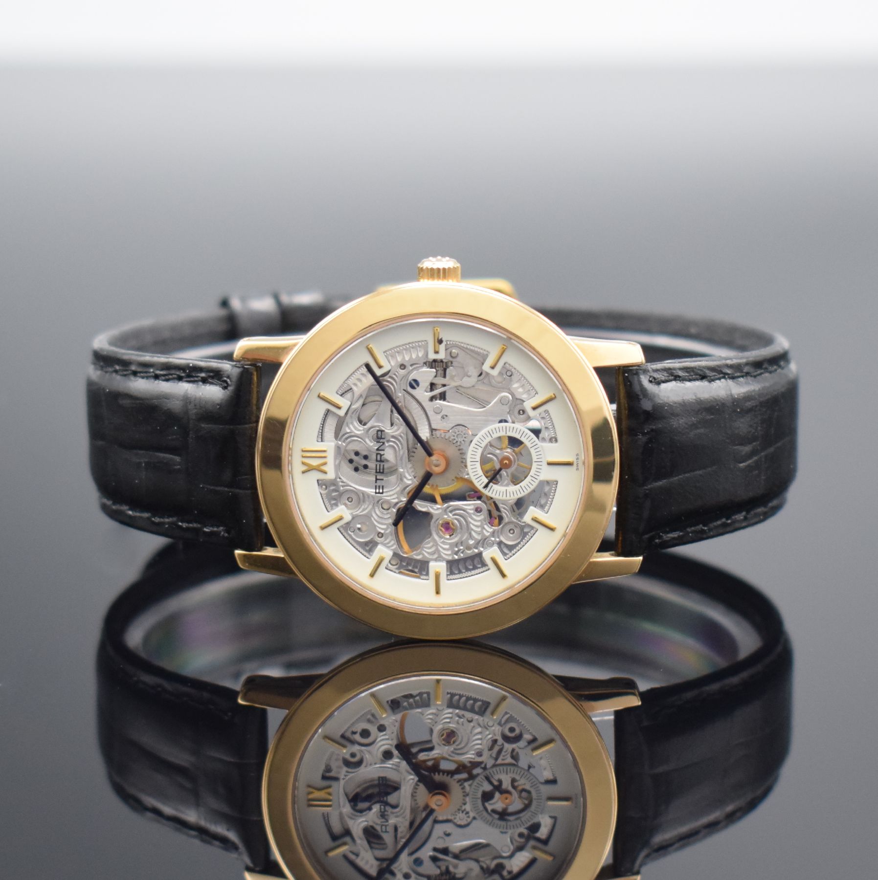 ETERNA skelettierte Armbanduhr in GG 750/000, Schweiz um 1990, Handaufzug, in limitierter Auflage, Ref. 1856, beids. vergl. Geh., Boden aufgedr., ...