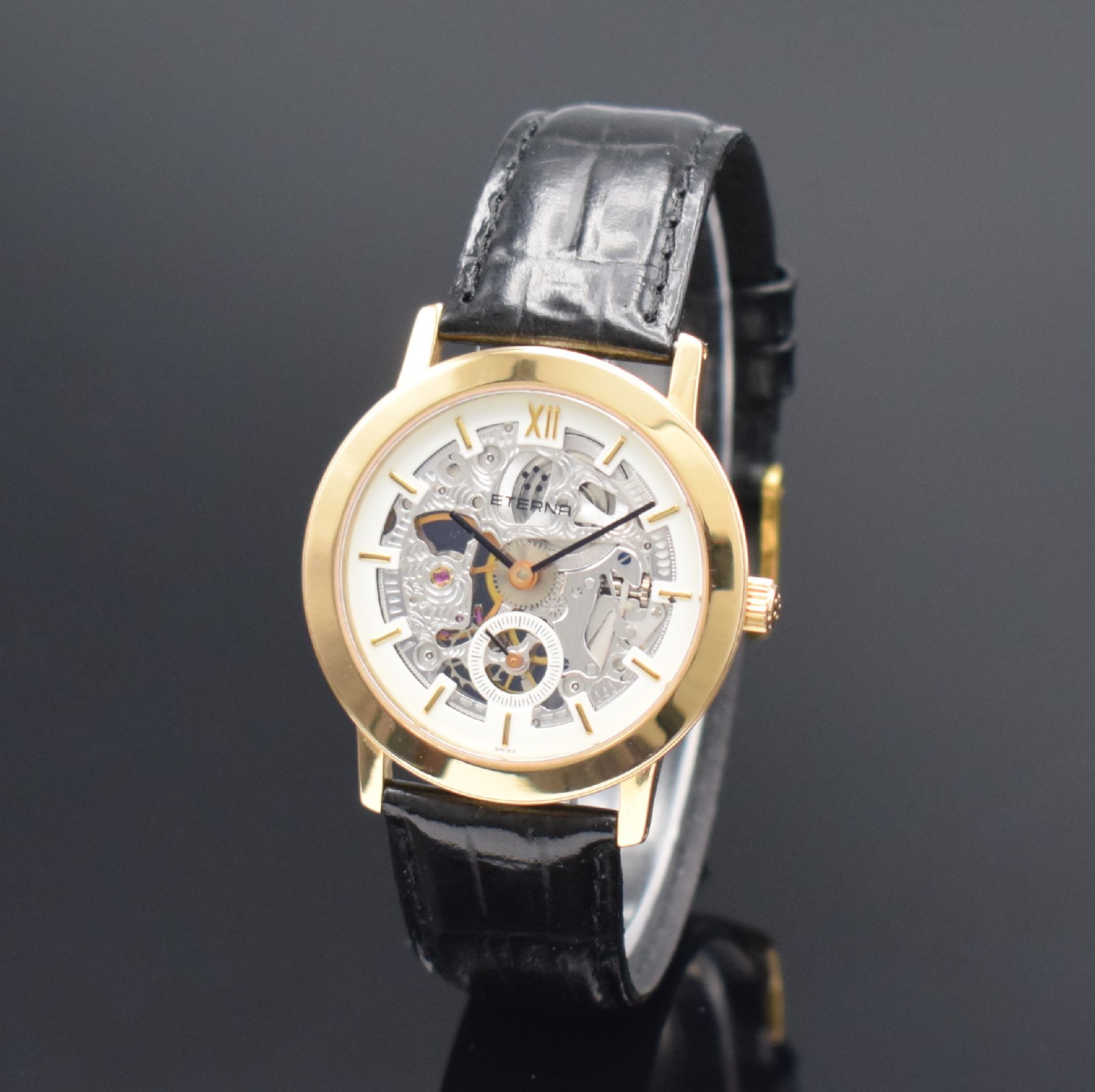 Detail b: ETERNA skelettierte Armbanduhr in GG 750/000, Schweiz um 1990, Handaufzug, in limitierter Auflage, Ref. 1856, beids. vergl. Geh., Boden aufgedr., ...