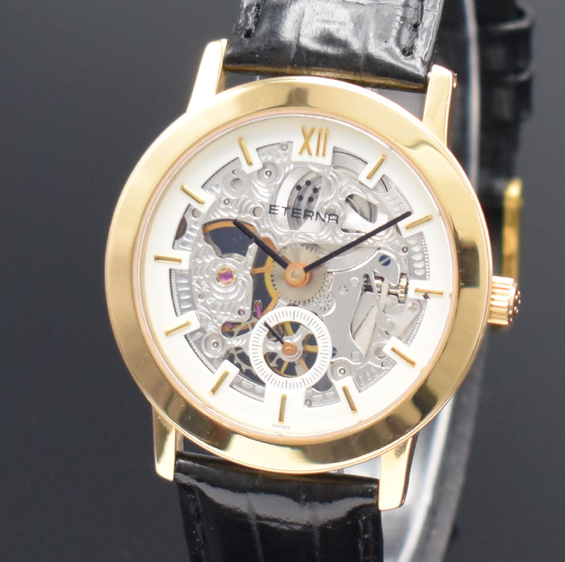 Detail c: ETERNA skelettierte Armbanduhr in GG 750/000, Schweiz um 1990, Handaufzug, in limitierter Auflage, Ref. 1856, beids. vergl. Geh., Boden aufgedr., ...