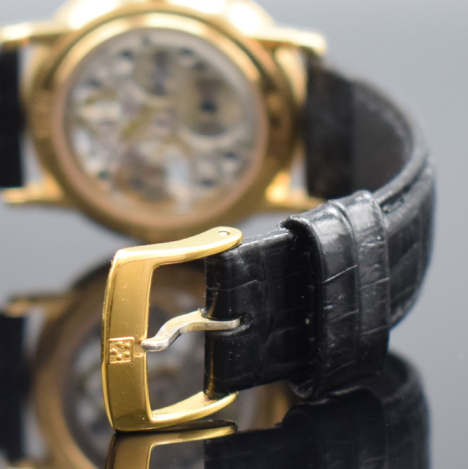 Detail d: ETERNA skelettierte Armbanduhr in GG 750/000, Schweiz um 1990, Handaufzug, in limitierter Auflage, Ref. 1856, beids. vergl. Geh., Boden aufgedr., ...