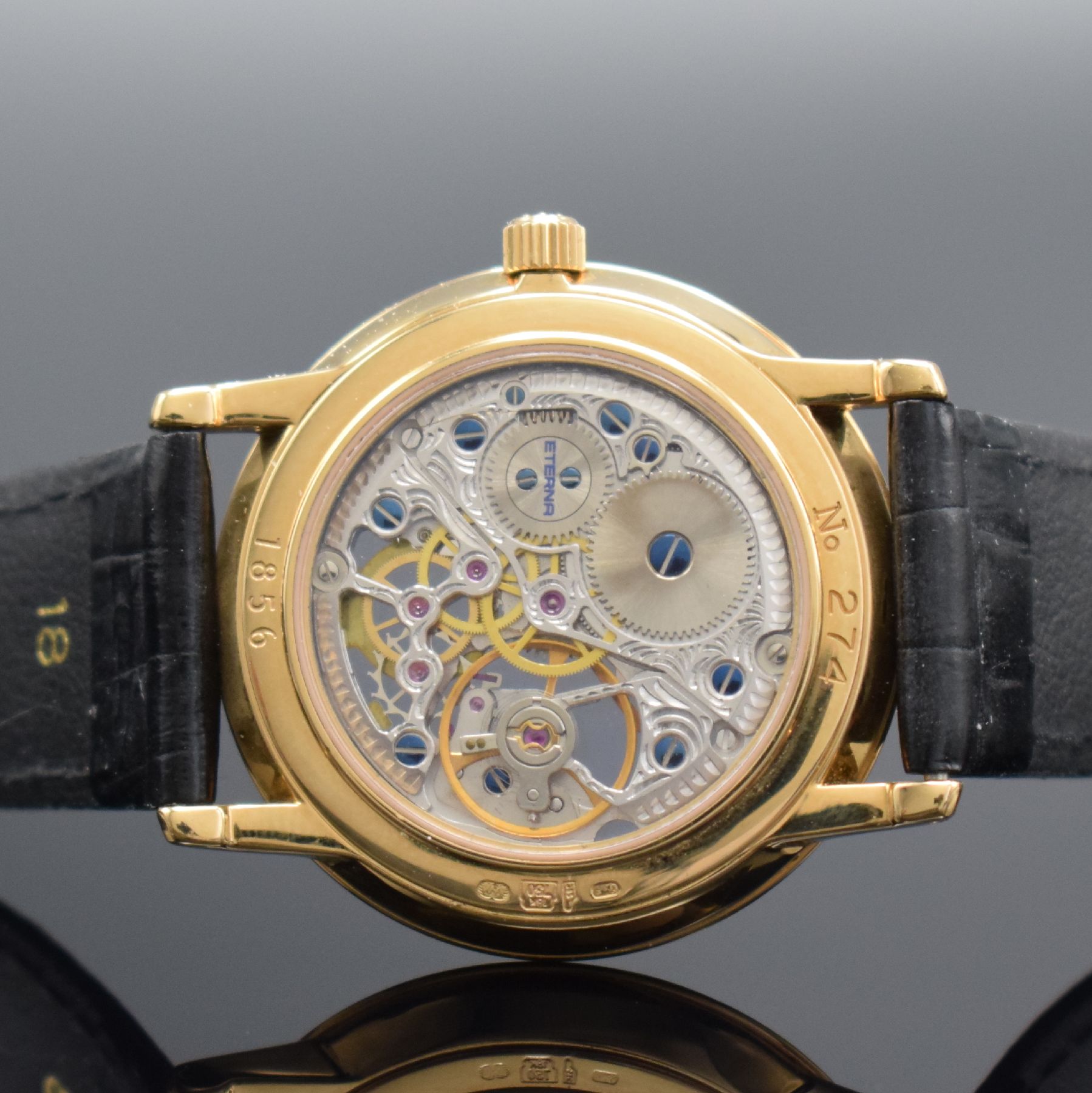 Detail f: ETERNA skelettierte Armbanduhr in GG 750/000, Schweiz um 1990, Handaufzug, in limitierter Auflage, Ref. 1856, beids. vergl. Geh., Boden aufgedr., ...
