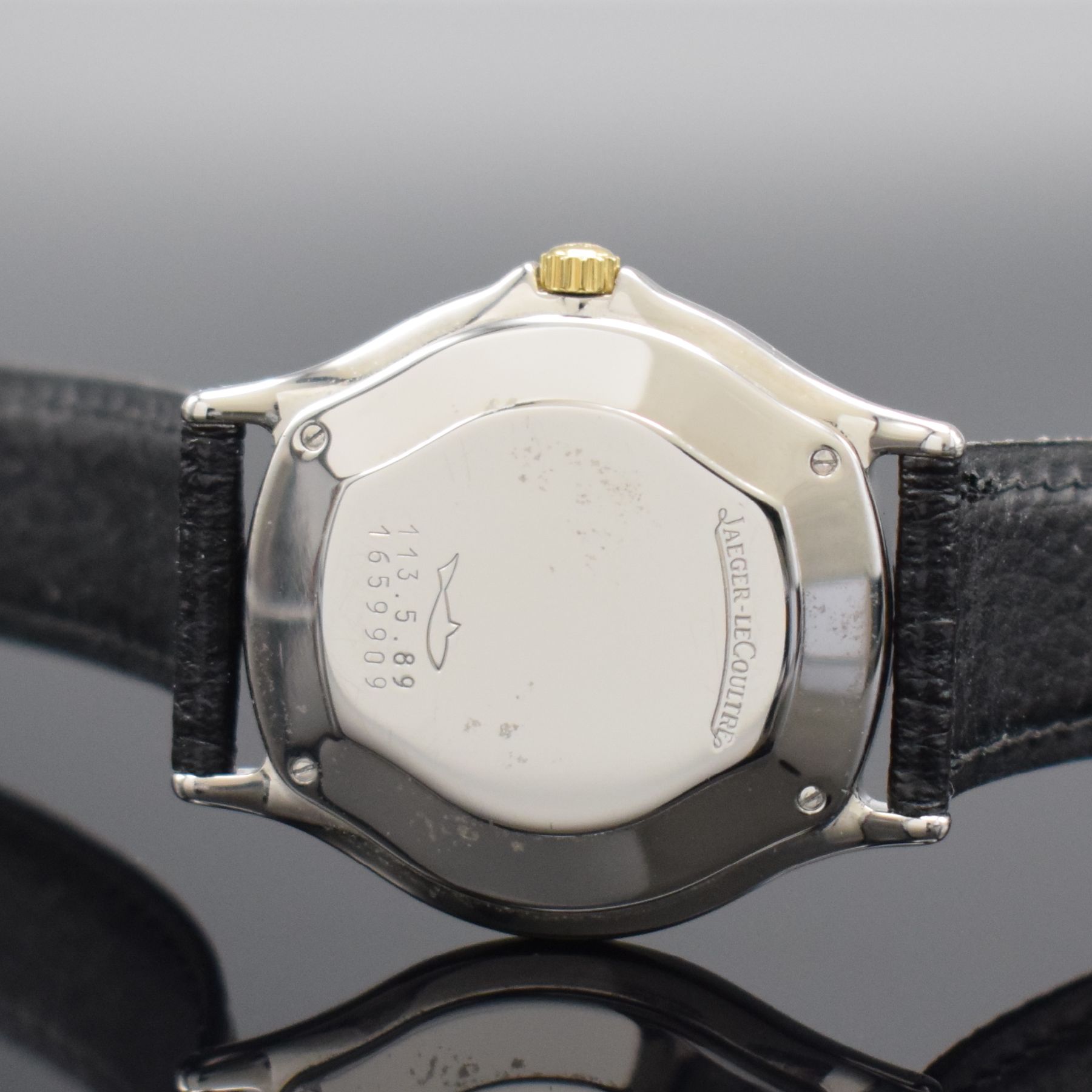 Detail f: Jaeger-LeCoultre Armbanduhr in Stahl/Gold, Schweiz um 1985, Automatik, Ref. 113.5.89, Boden 4-fach verschr., neutr. Lederband m. orig. Dornschl., ...