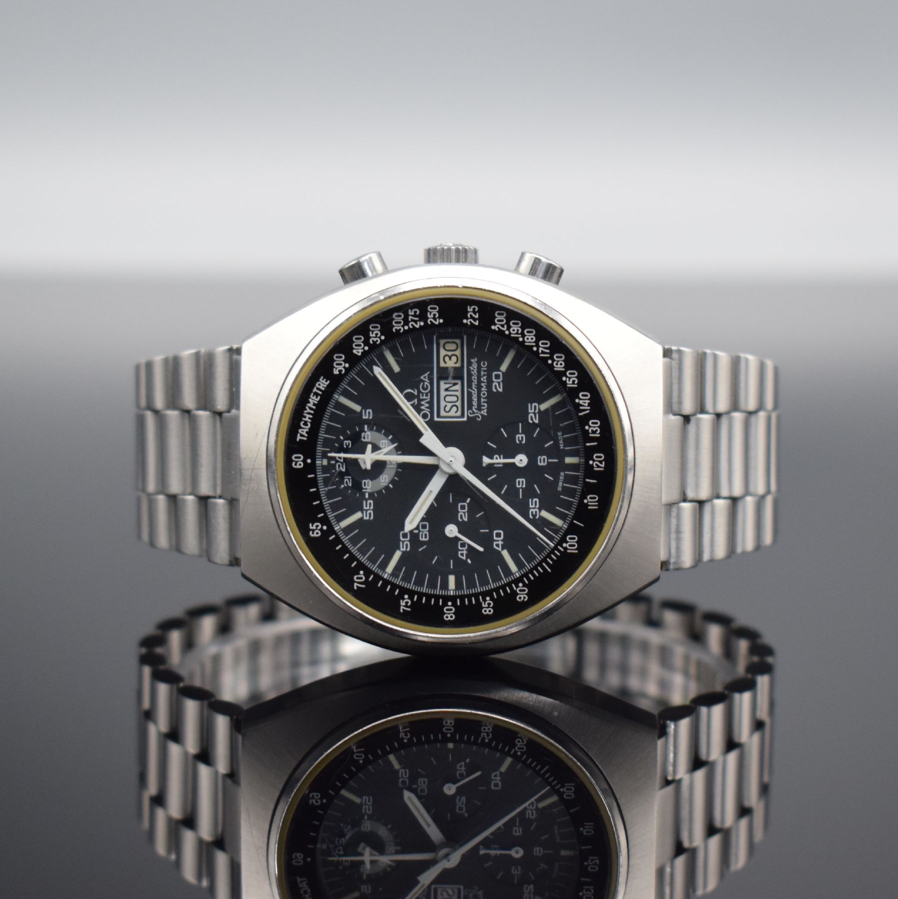 OMEGA Speedmaster Herrenarmbanduhr mit Chronograph in Edelstahl Referenz 176.0012, Schweiz um 1980, Automatik, Boden m. Seamasterlogo geschr., orig. ...