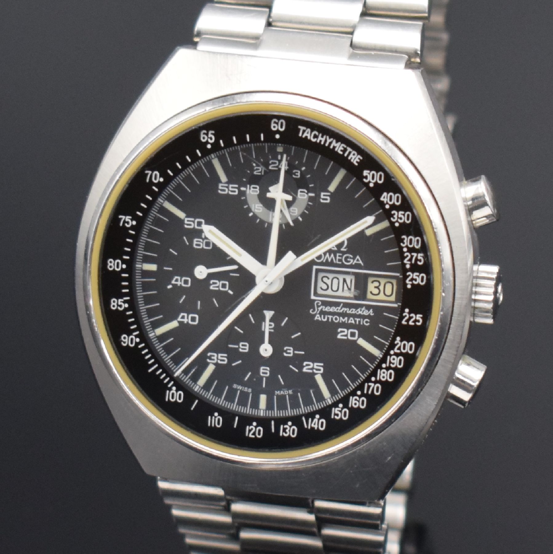 Detail c: OMEGA Speedmaster Herrenarmbanduhr mit Chronograph in Edelstahl Referenz 176.0012, Schweiz um 1980, Automatik, Boden m. Seamasterlogo geschr., orig. ...