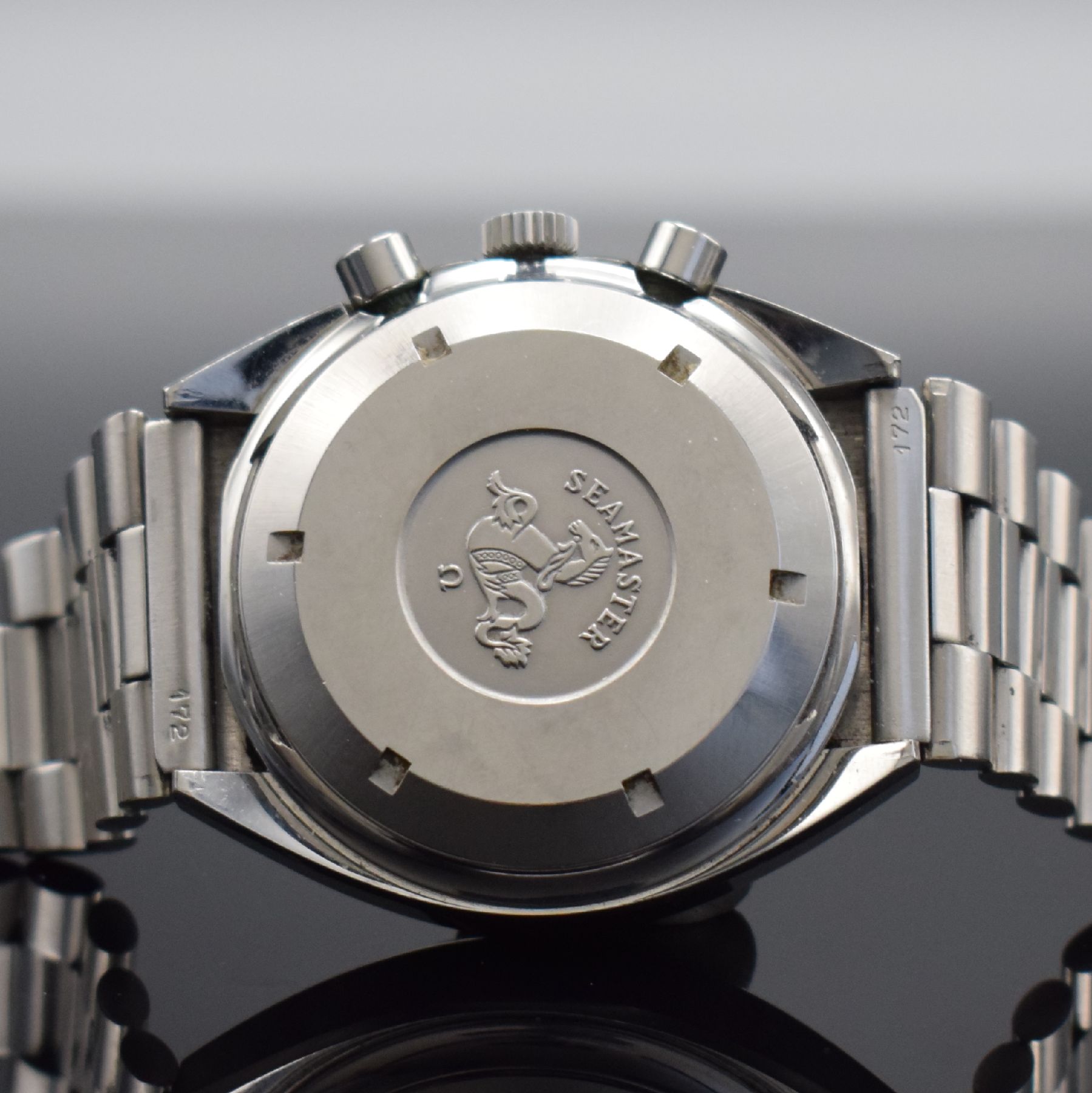 Detail f: OMEGA Speedmaster Herrenarmbanduhr mit Chronograph in Edelstahl Referenz 176.0012, Schweiz um 1980, Automatik, Boden m. Seamasterlogo geschr., orig. ...