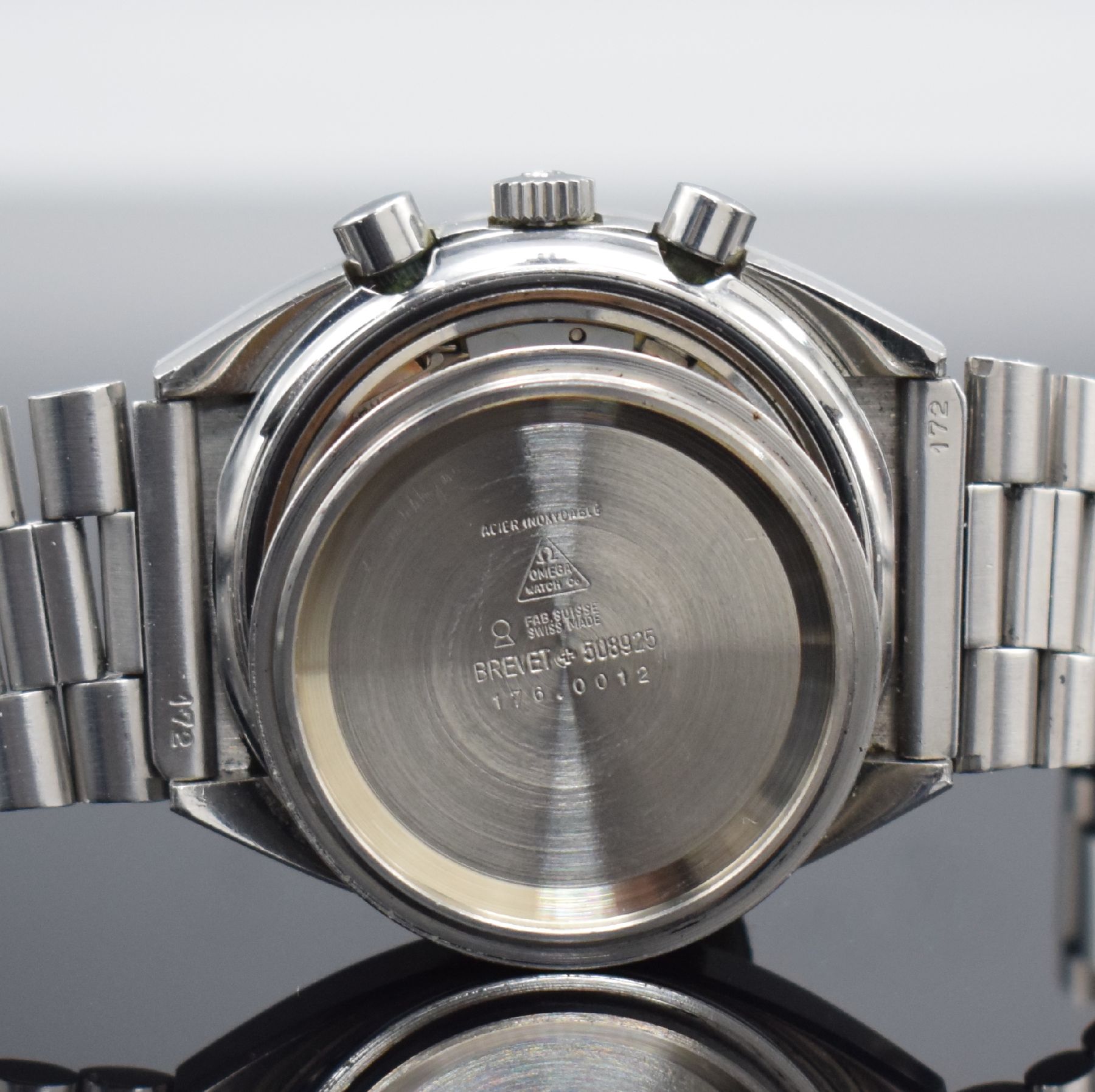 Detail i: OMEGA Speedmaster Herrenarmbanduhr mit Chronograph in Edelstahl Referenz 176.0012, Schweiz um 1980, Automatik, Boden m. Seamasterlogo geschr., orig. ...