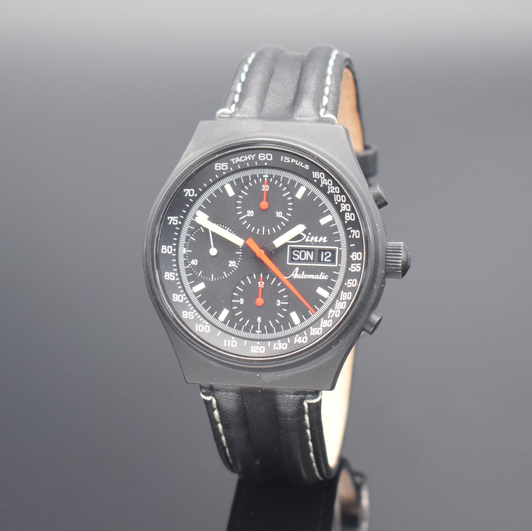 Detail b: SINN Herrenarmbanduhr mit Chronograph, Schweiz um 2000, Automatik, geschw. Edelstahlgeh., Boden & Krone verschr., schwarzes Zifferbl. m. Leuchtind. & ...