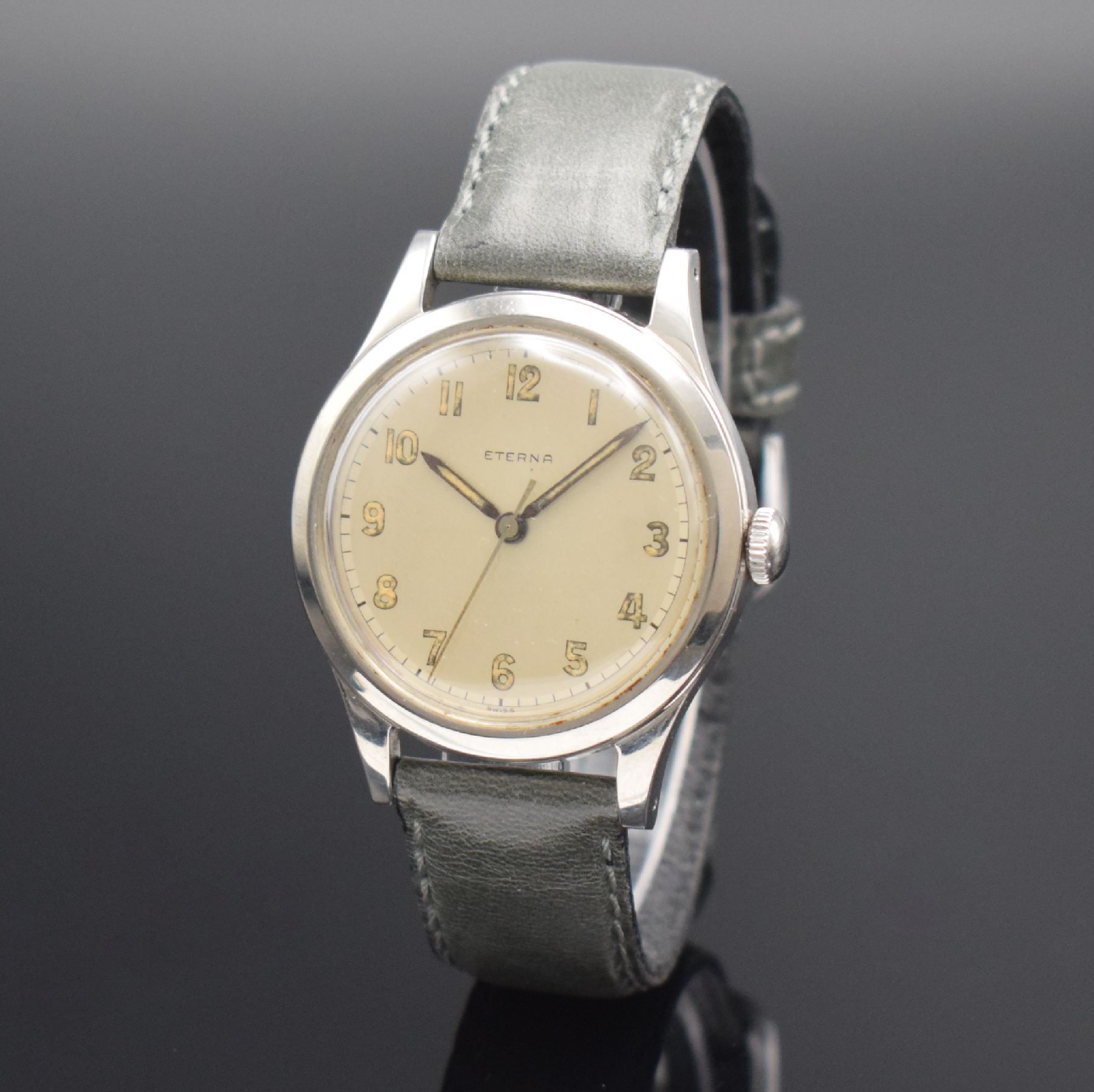 ETERNA große verschraubte Herrenarmbanduhr in Stahl, Schweiz um 1950, Handaufzug, 2-tlg. Geh., silb. Duoton-Zifferbl., arab. Leucht- zahlen, orig. ...