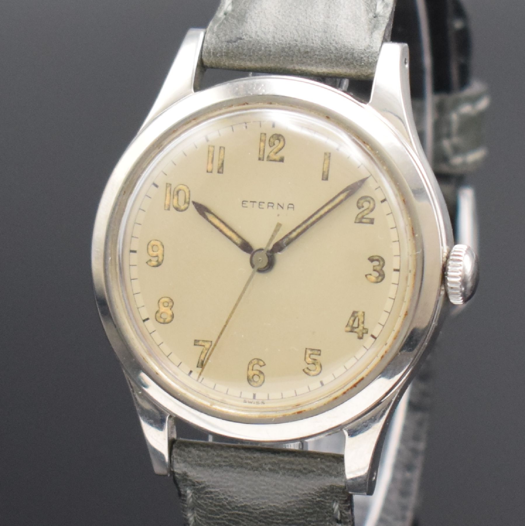 Detail a: ETERNA große verschraubte Herrenarmbanduhr in Stahl, Schweiz um 1950, Handaufzug, 2-tlg. Geh., silb. Duoton-Zifferbl., arab. Leucht- zahlen, orig. ...