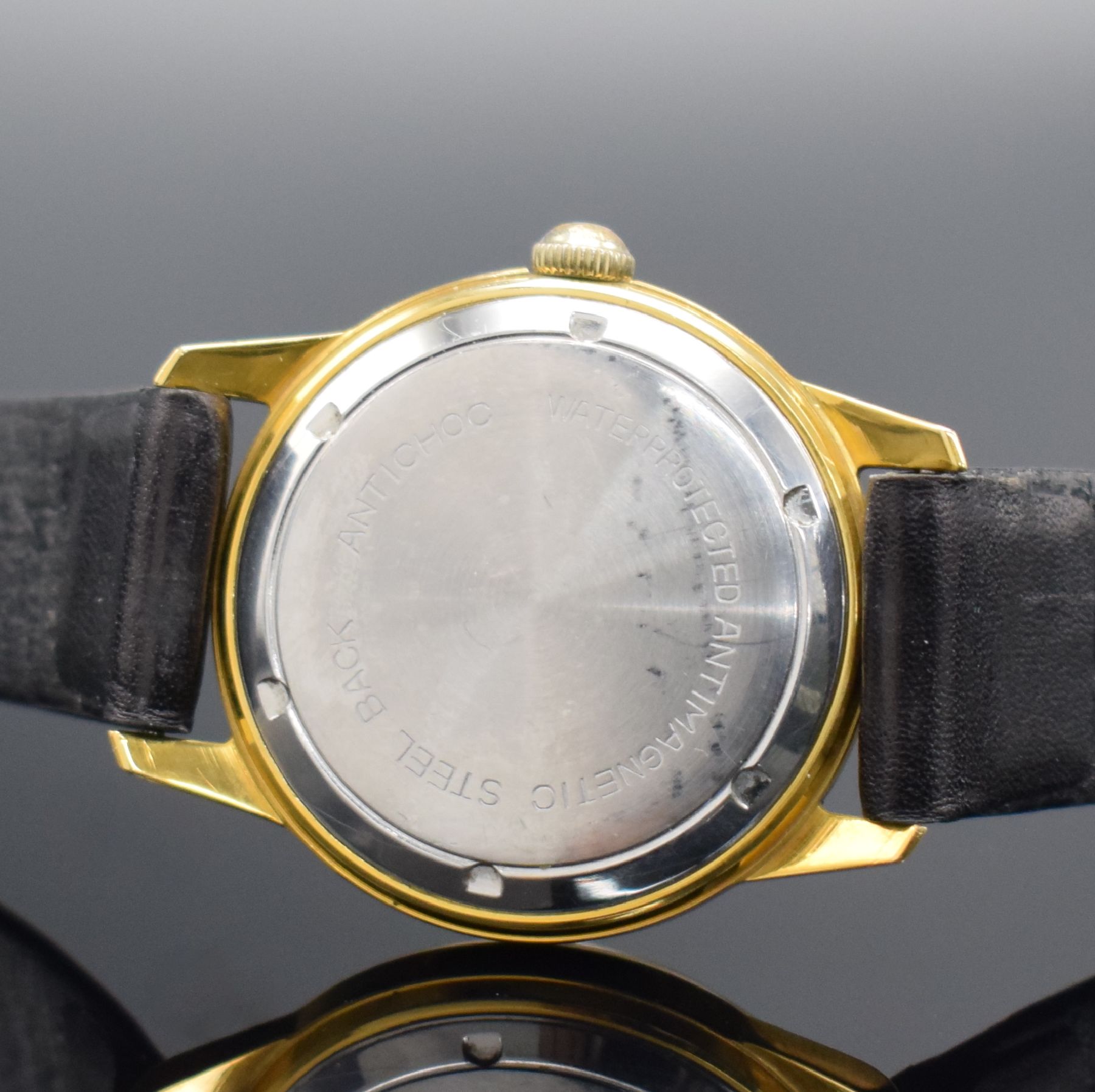 Detail d: BIFORA unima Kaliber 120 seltene Armbanduhr, Deutschland um 1955, Handaufzug, verg. Geh. m. verschr. Stahlboden, silb. Zifferbl., gold. Indizes & ...
