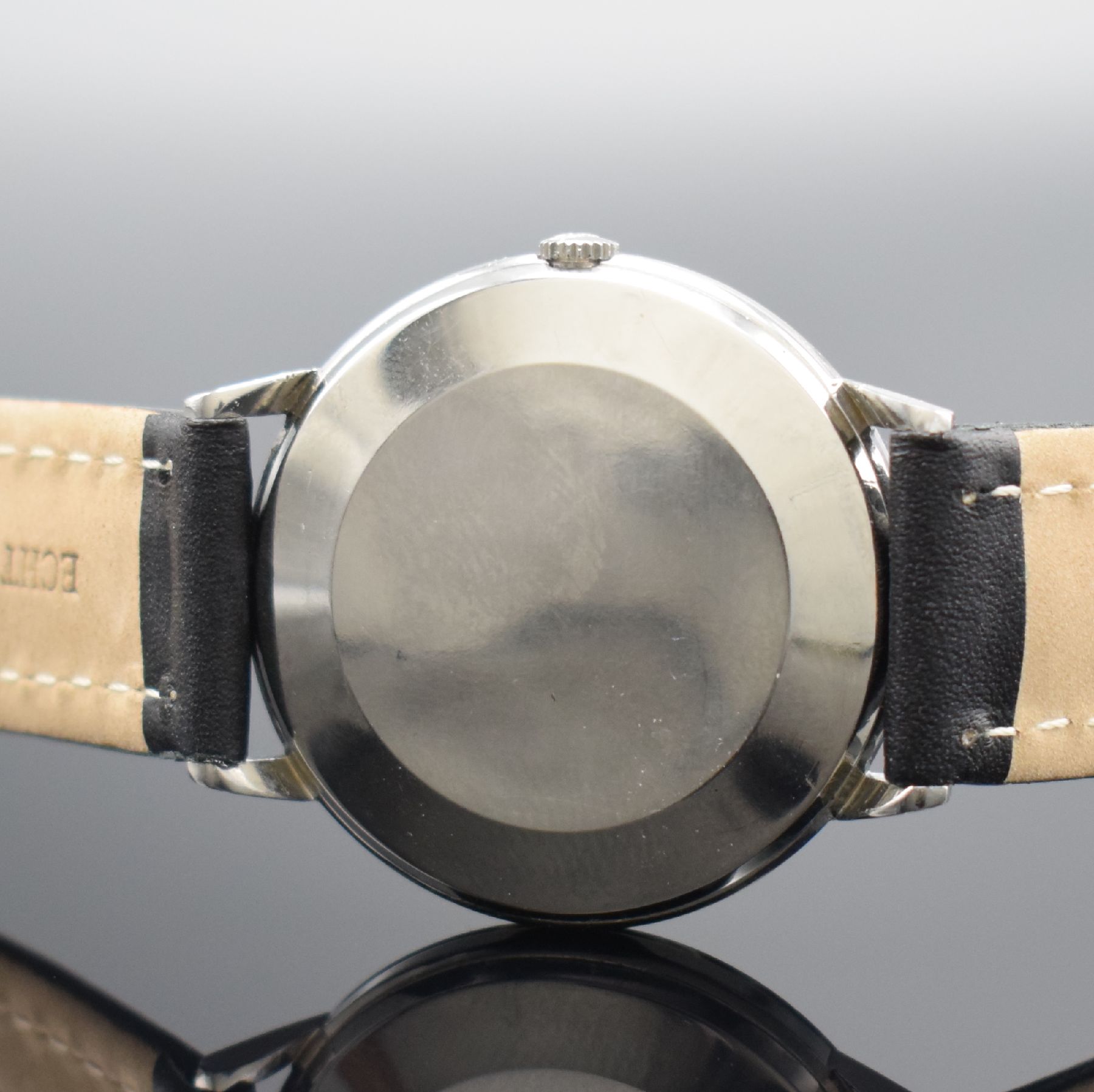 Detail e: IWC Referenz 803 A Herrenarmbanduhr in Stahl, Schweiz um 1965, Automatik, aufgedr. Boden dell., silb. Zifferbl., silb. Indizes & Zeiger, vern. Werk ...
