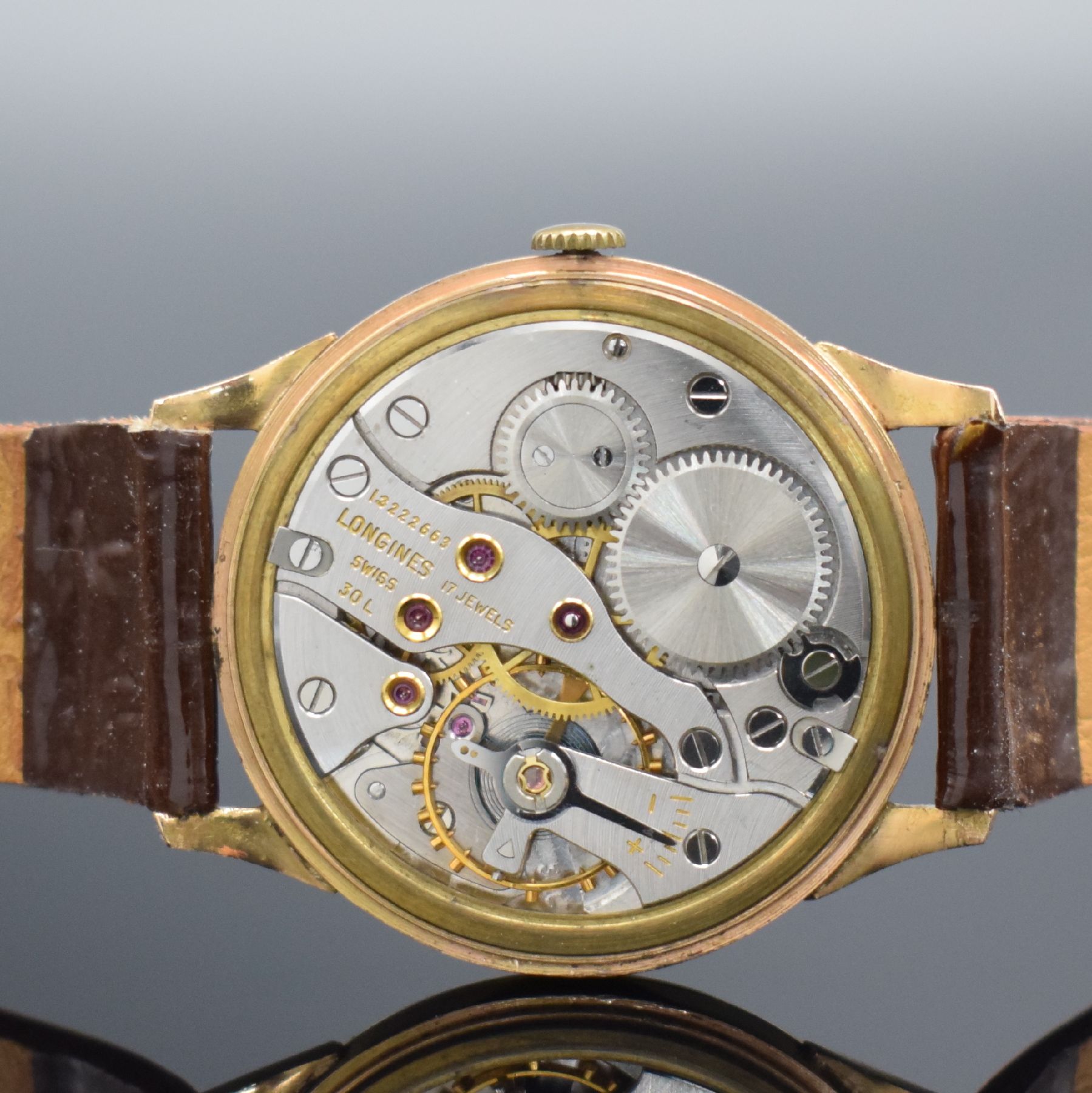 Detail e: LONGINES 30 L große Herrenarmbanduhr in RG 750/000, Schweiz/Argentinien um 1967, Handaufzug, neutrales argentinisches Geh., Boden & Glasrand ...
