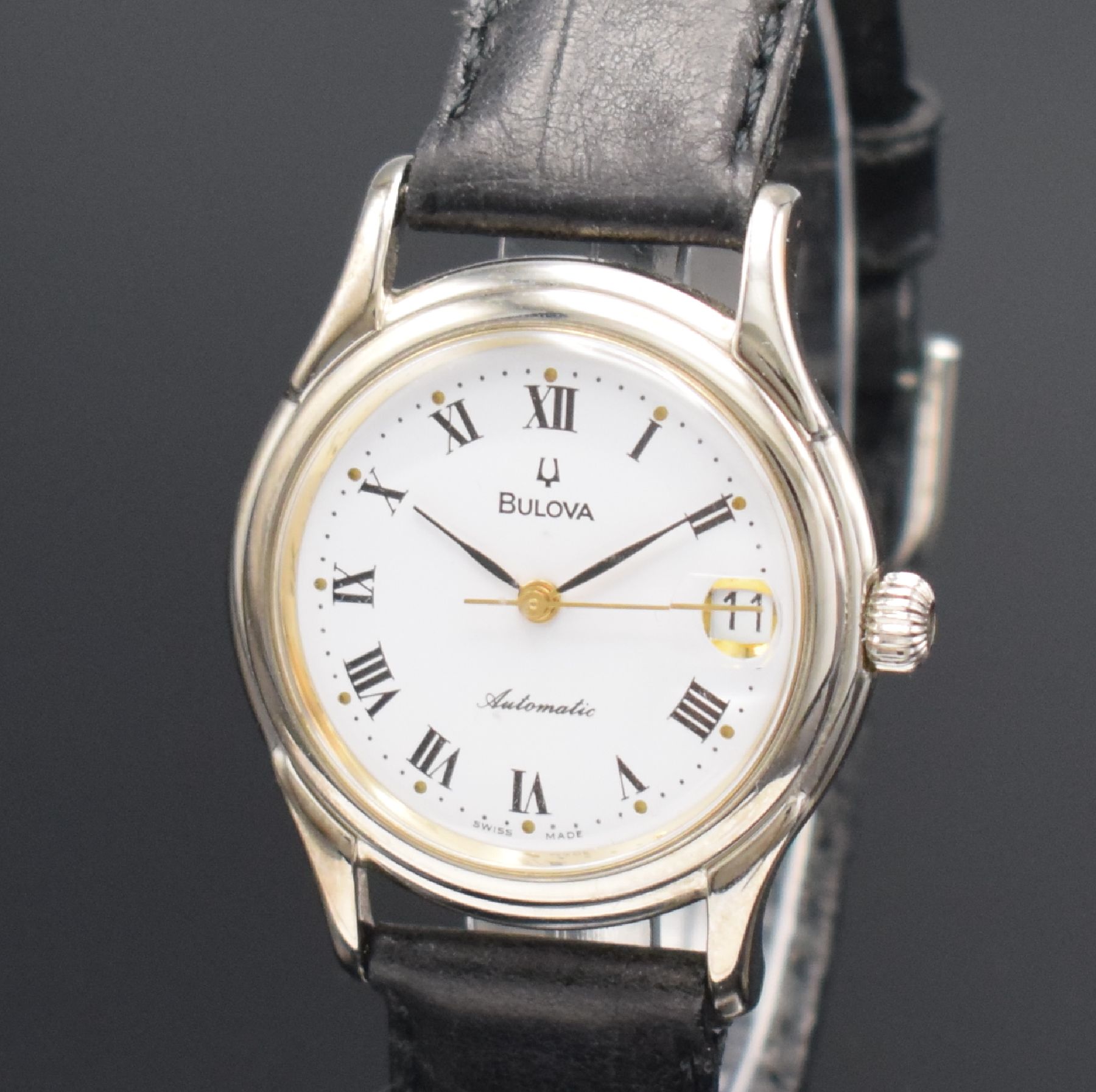 Detail c: BULOVA Armbanduhr, Automatik, Schweiz um 1995, verchr. Gehäuse, beids. vergl., Boden verschr., weißes Zifferbl. m. röm. Zahlen, Datum, verg. Werk ...
