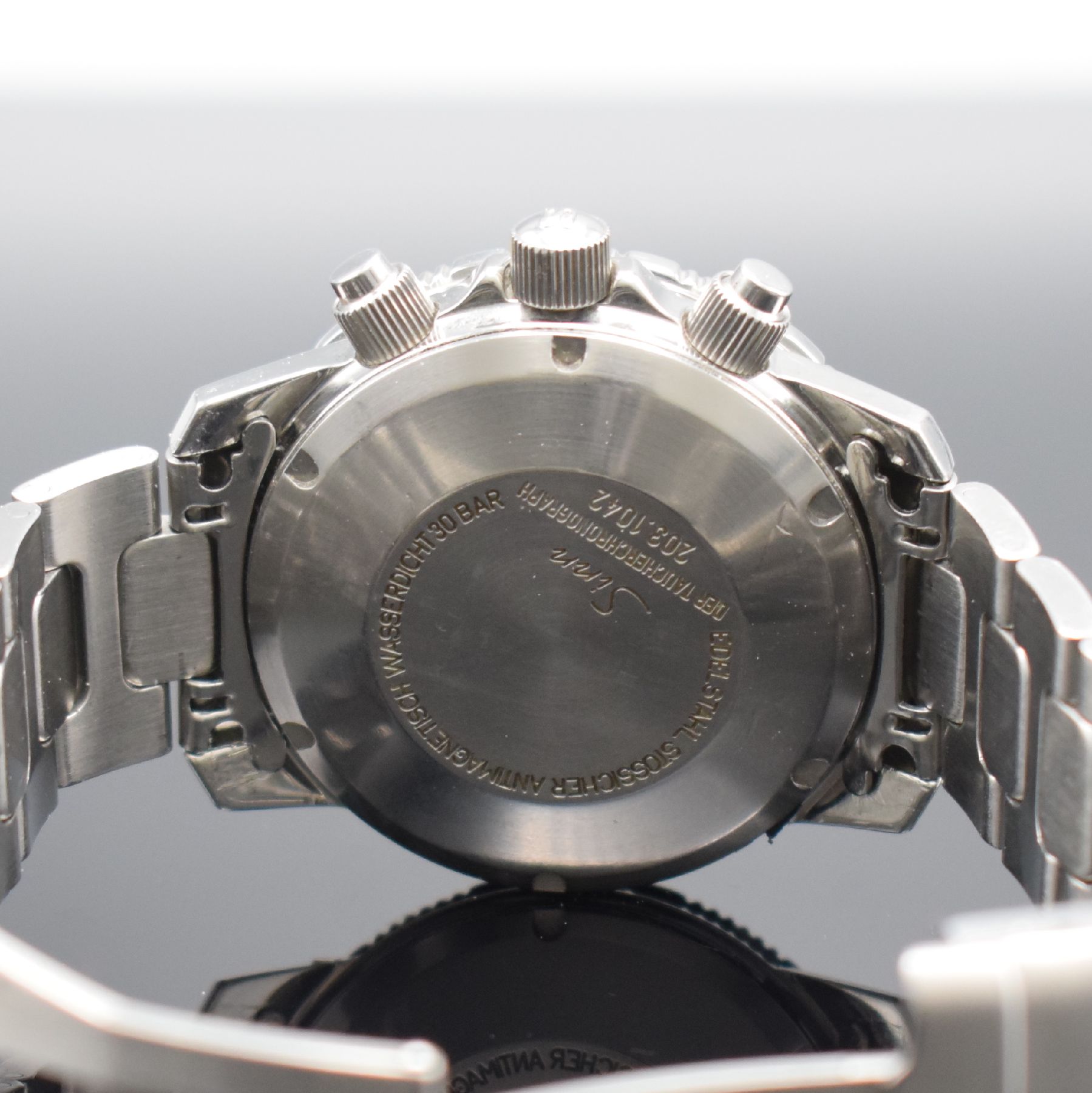 Detail d: SINN Armbandchronograph Referenz 203, Automatik, Schweiz um 1995, Edelstahlgeh. inkl. Gliederband m. Faltschl. & Tauchverlängerung, Boden, Krone & ...