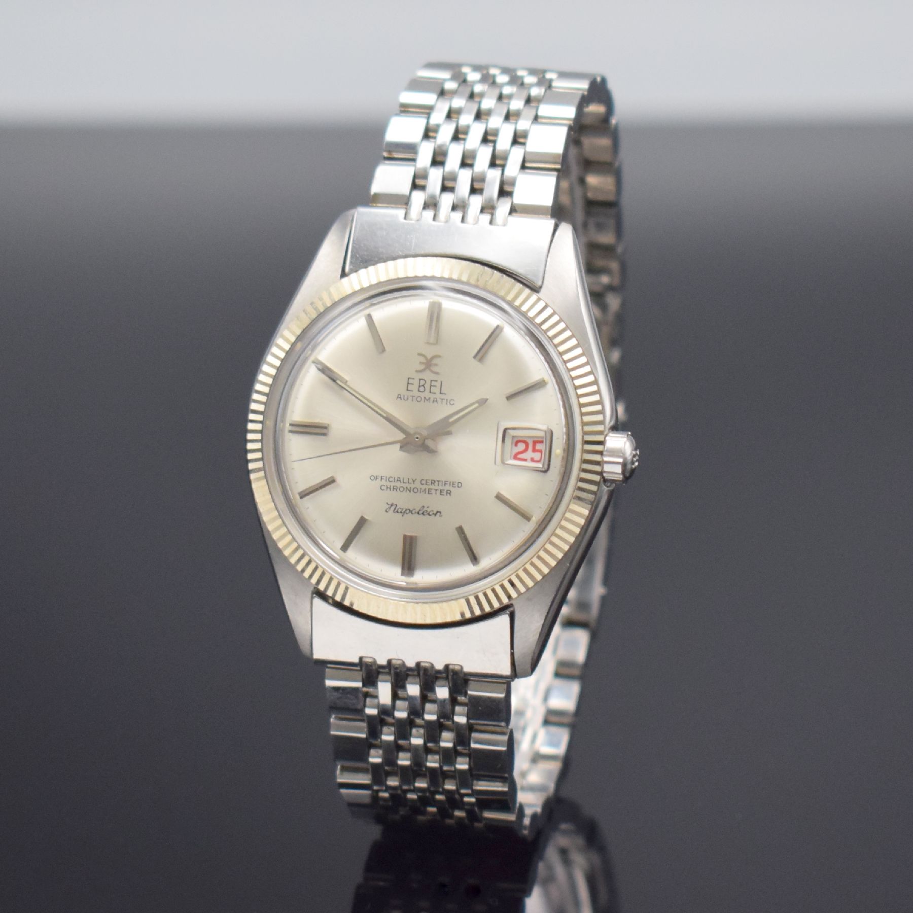 Detail b: EBEL seltener Armbandchronometer Napoleon, Automatik, Schweiz um 1970, Edelstahlgeh. inkl. orig. Gliederband m. Faltschl., Boden verschr., geriffelte ...
