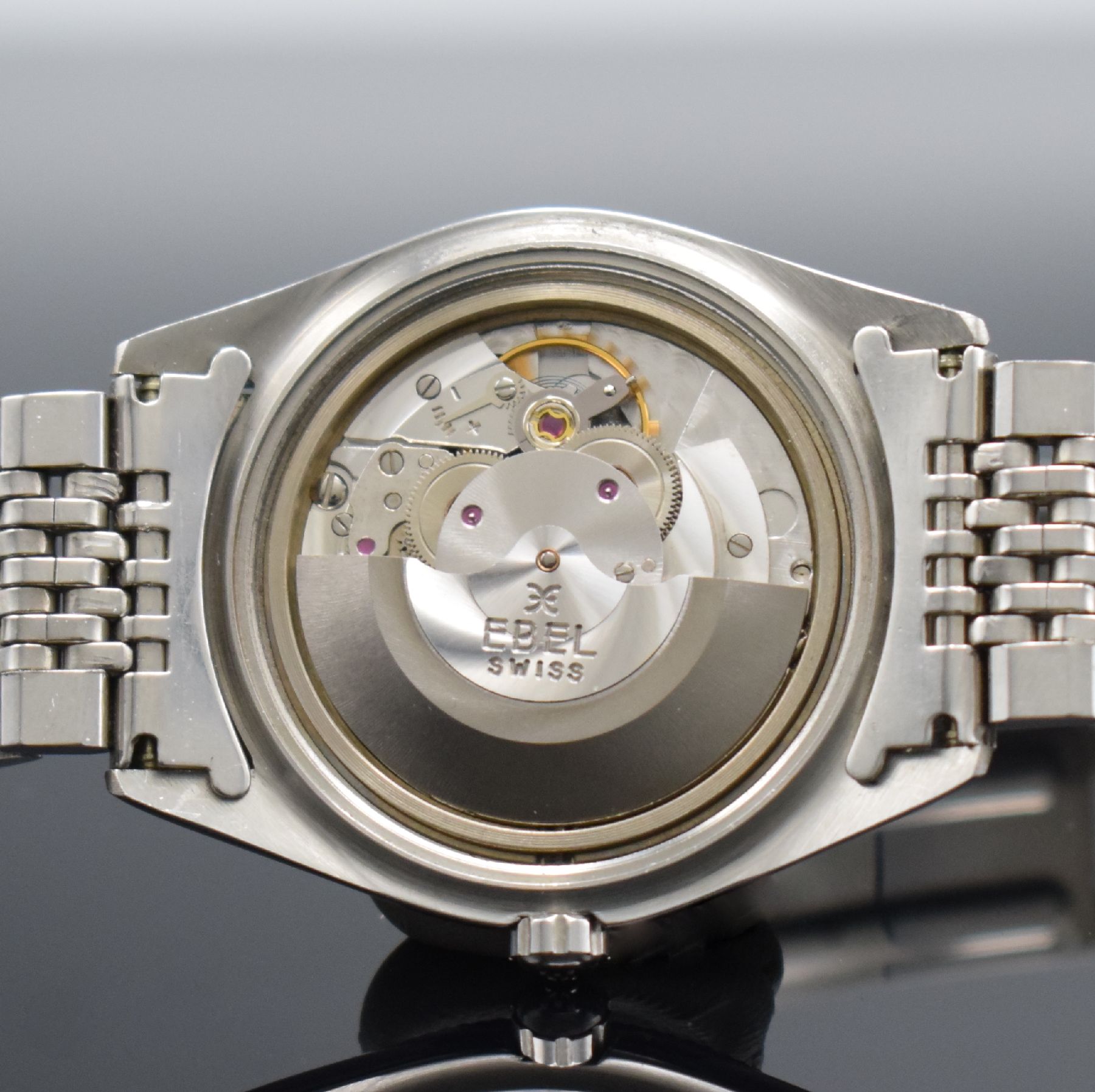 Detail h: EBEL seltener Armbandchronometer Napoleon, Automatik, Schweiz um 1970, Edelstahlgeh. inkl. orig. Gliederband m. Faltschl., Boden verschr., geriffelte ...