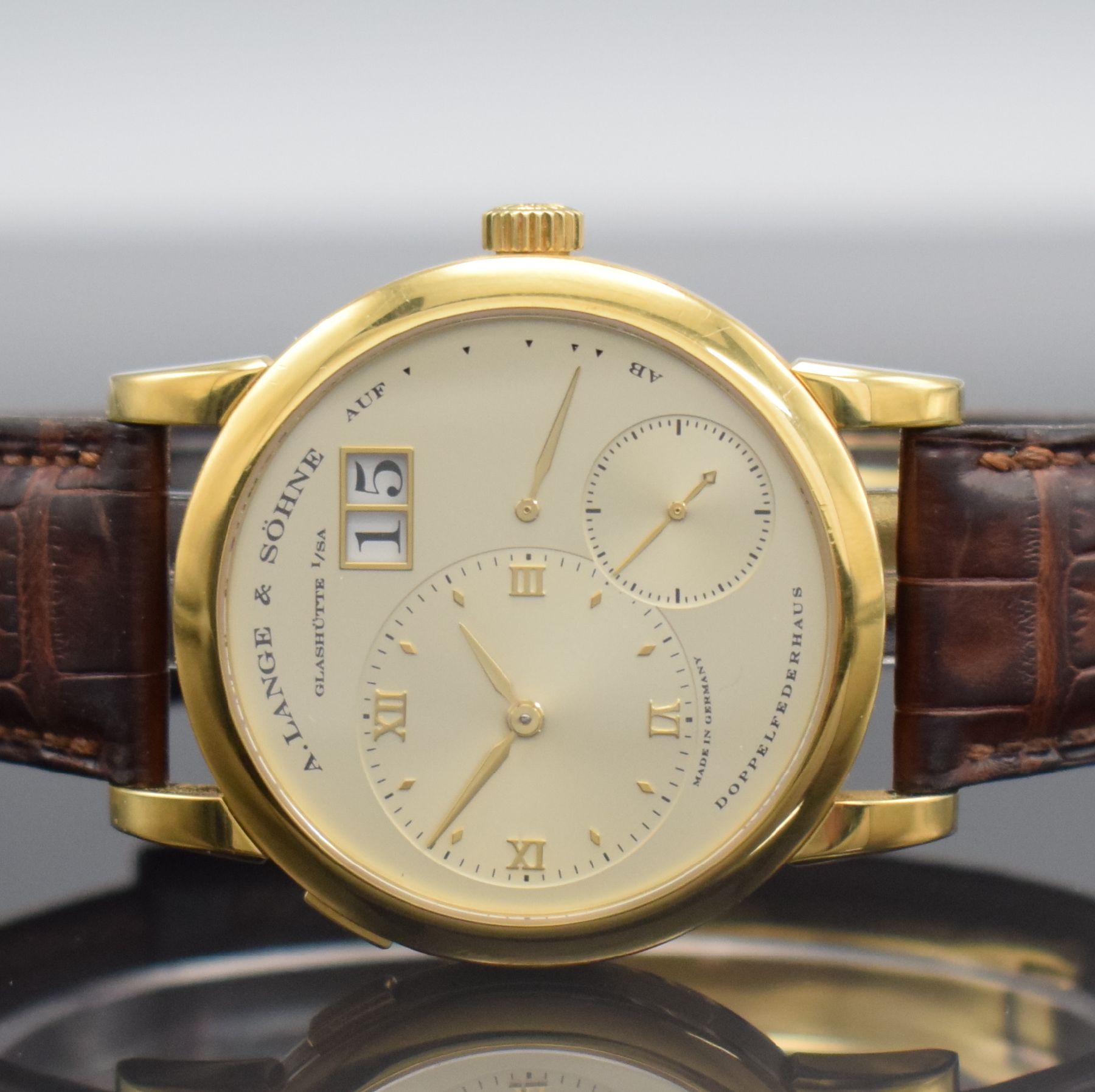 Detail a: A. LANGE & SÖHNE "LANGE 1" feine Herrenarmbanduhr in GG 750/000 Referenz 101.022, Handaufzug, massives beids. vergl. Geh., Boden 6-fach ...