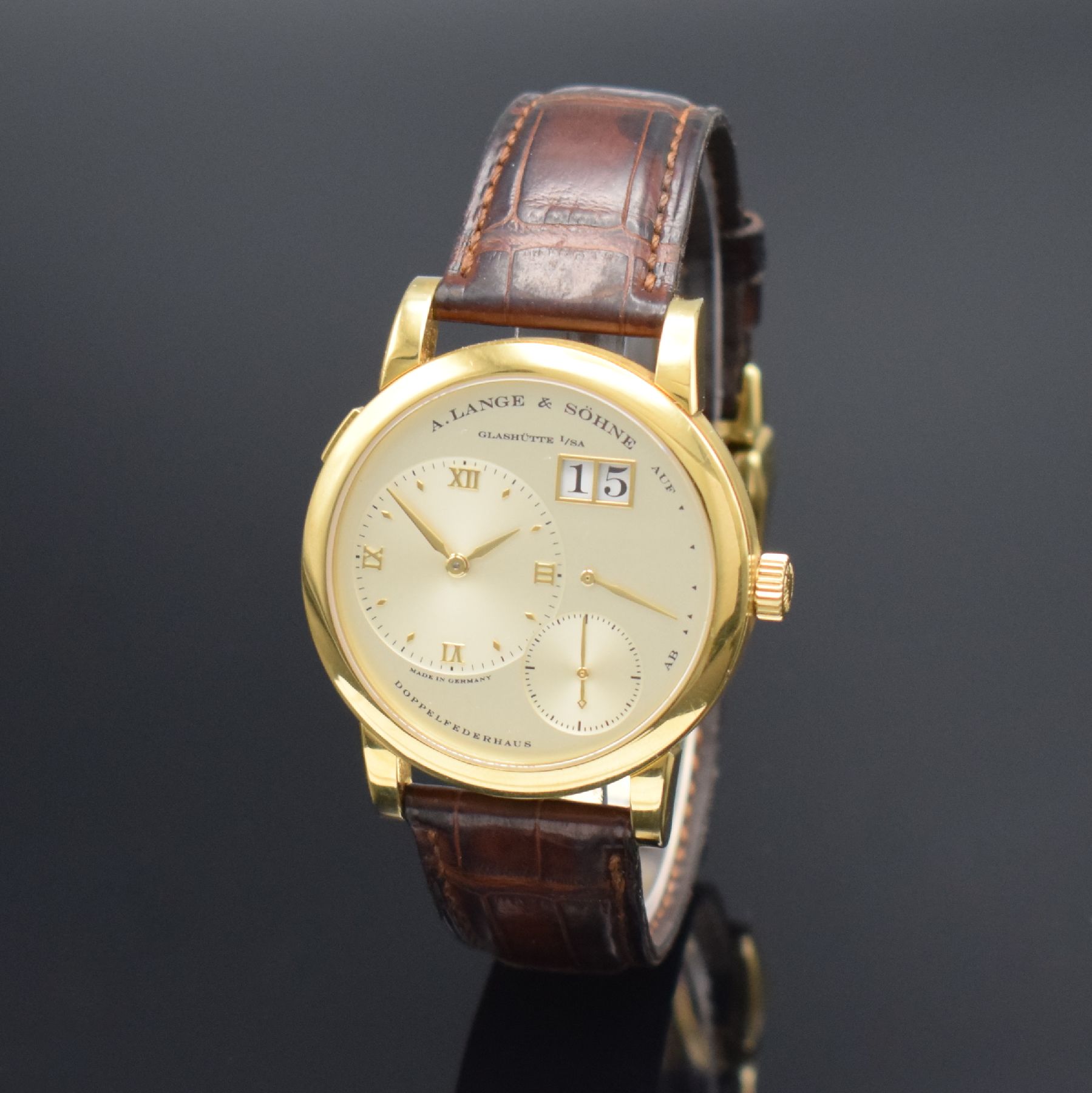 Detail b: A. LANGE & SÖHNE "LANGE 1" feine Herrenarmbanduhr in GG 750/000 Referenz 101.022, Handaufzug, massives beids. vergl. Geh., Boden 6-fach ...