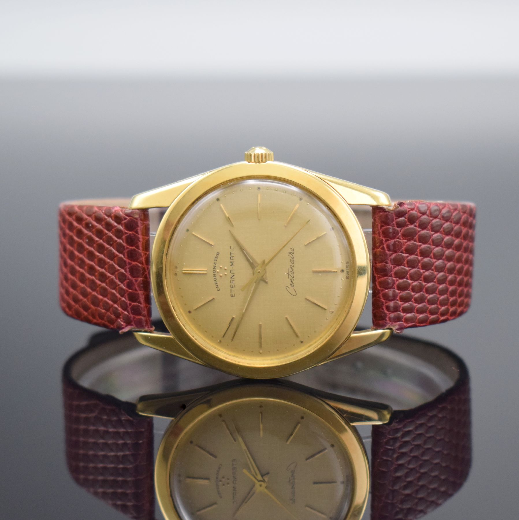 ETERNA-MATIC Centenaire Chronometer Herrenarmbanduhr in GG 750/000, Schweiz um 1965, Automatik, 3-teil. Geh., Boden geschr., Glasrand aufgedr., gold. ...