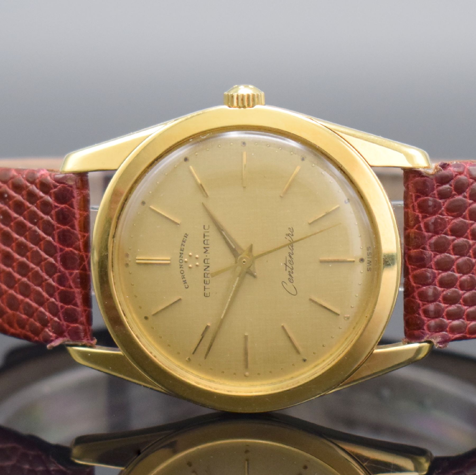 Detail a: ETERNA-MATIC Centenaire Chronometer Herrenarmbanduhr in GG 750/000, Schweiz um 1965, Automatik, 3-teil. Geh., Boden geschr., Glasrand aufgedr., gold. ...